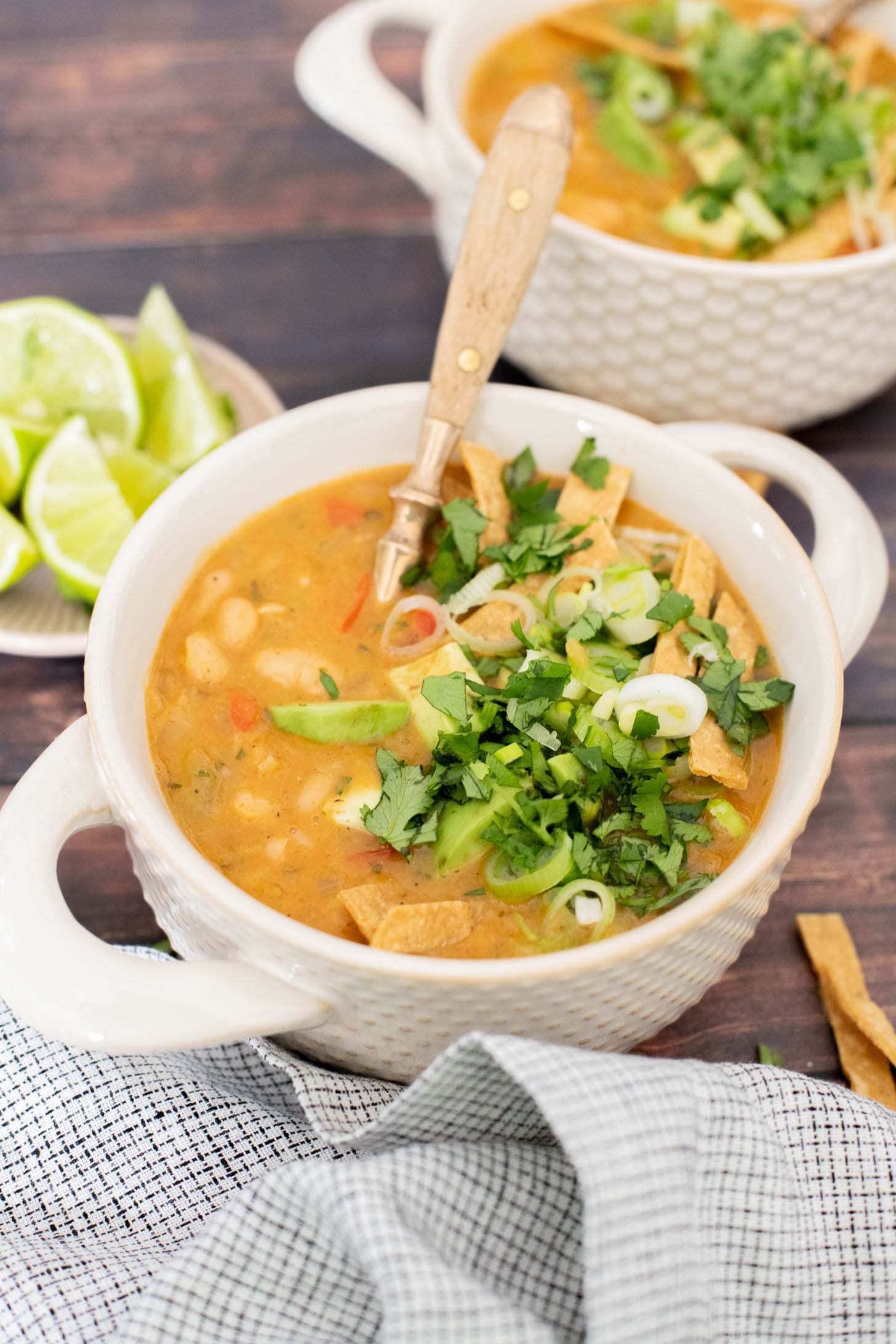 This White Bean Chili is a simple & healthy one-pot dinner! You get a cozy dinner in 30 minutes with very few dishes | ThisSavoryVegan.com