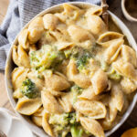 This Creamy Pesto Pasta with Broccoli is not only dairy-free it also has some sneaky protein. Made in one-pot for an easy weeknight dinner | ThisSavoryVegan.com
