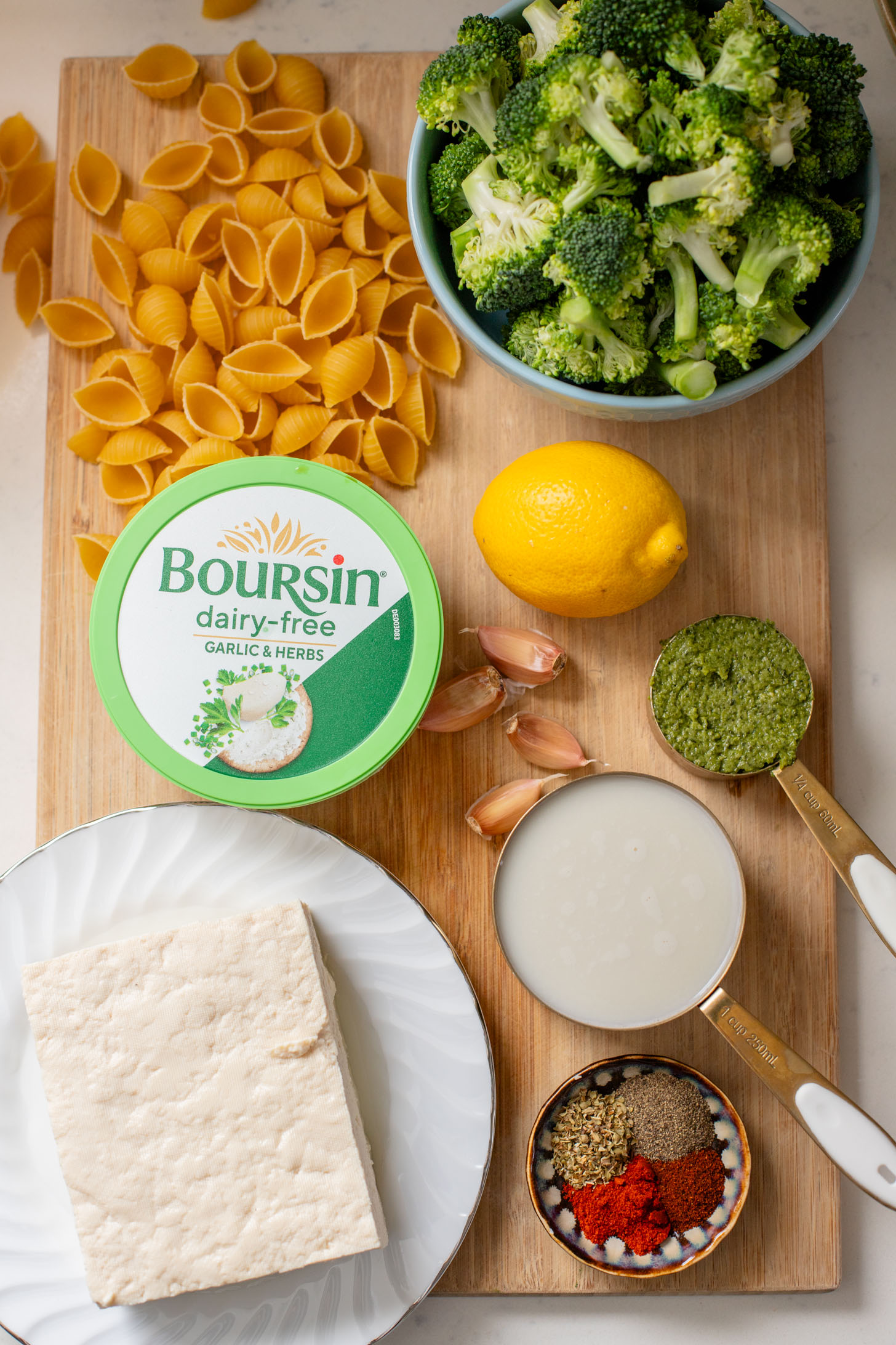 This Creamy Pesto Pasta with Broccoli is not only dairy-free it also has some sneaky protein. Made in one-pot for an easy weeknight dinner | ThisSavoryVegan.com