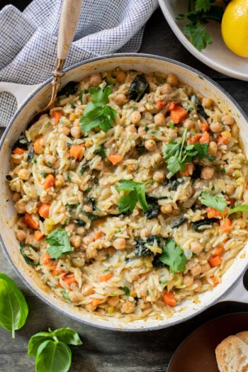 This Lemon Mustard Chickpeas & Orzo recipe is the perfect skillet dinner. Simple flavors like mustard, lemon juice & fresh herbs bring this one together | ThisSavoryVegan.com