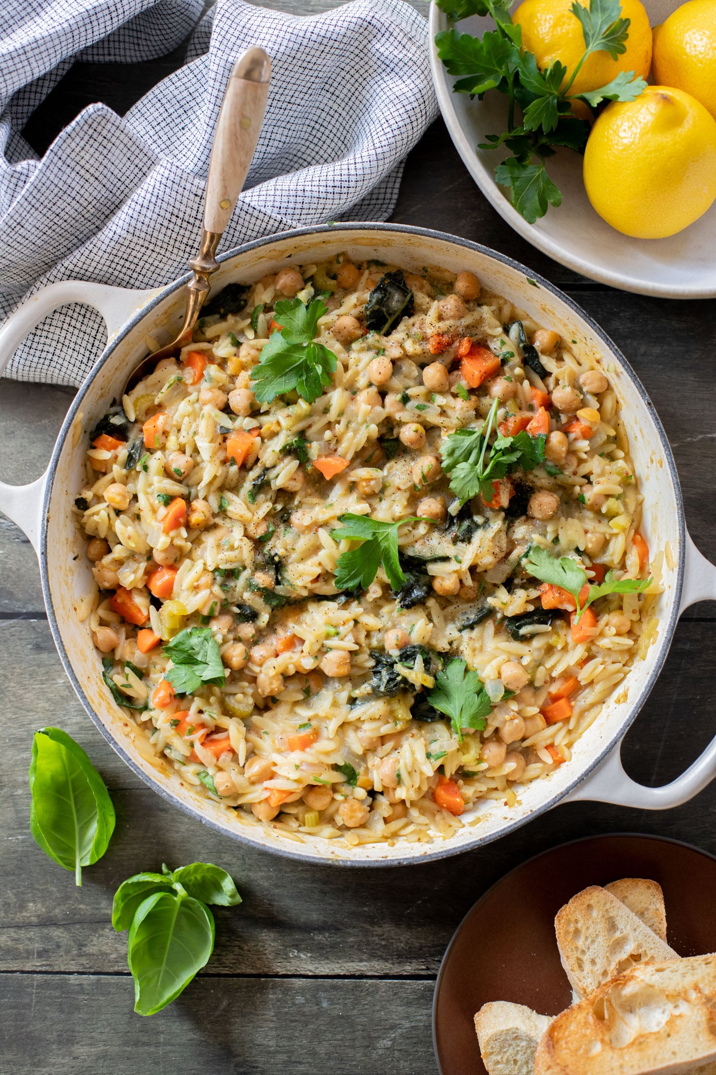 This Lemon Mustard Chickpeas & Orzo recipe is the perfect skillet dinner. Simple flavors like mustard, lemon juice & fresh herbs bring this one together | ThisSavoryVegan.com