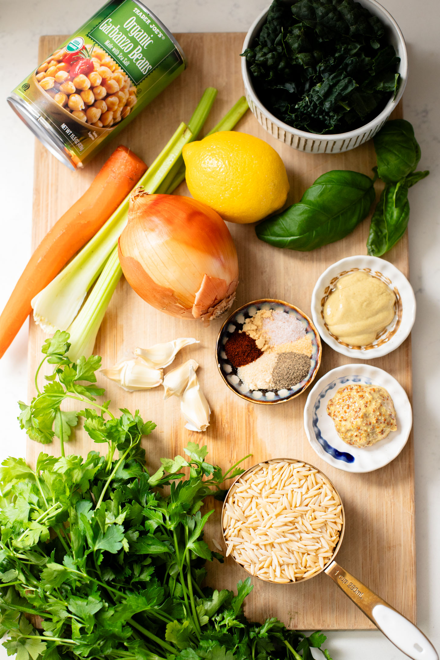 This Lemon Mustard Chickpeas & Orzo recipe is the perfect skillet dinner. Simple flavors like mustard, lemon juice & fresh herbs bring this one together | ThisSavoryVegan.com