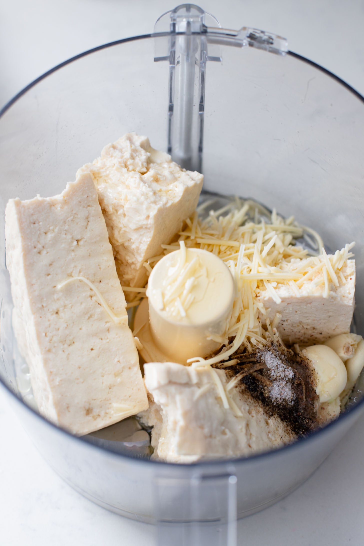 This Ravioli Lasagna is the ultimate family dinner! It is easy to assemble, feeds a crowd and is 100% dairy-free | ThisSavoryVegan.com