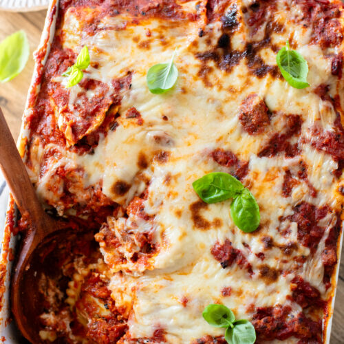 This Ravioli Lasagna is the ultimate family dinner! It is easy to assemble, feeds a crowd and is 100% dairy-free | ThisSavoryVegan.com