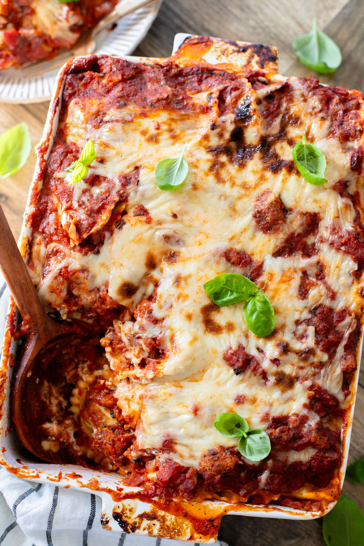 This Ravioli Lasagna is the ultimate family dinner! It is easy to assemble, feeds a crowd and is 100% dairy-free | ThisSavoryVegan.com
