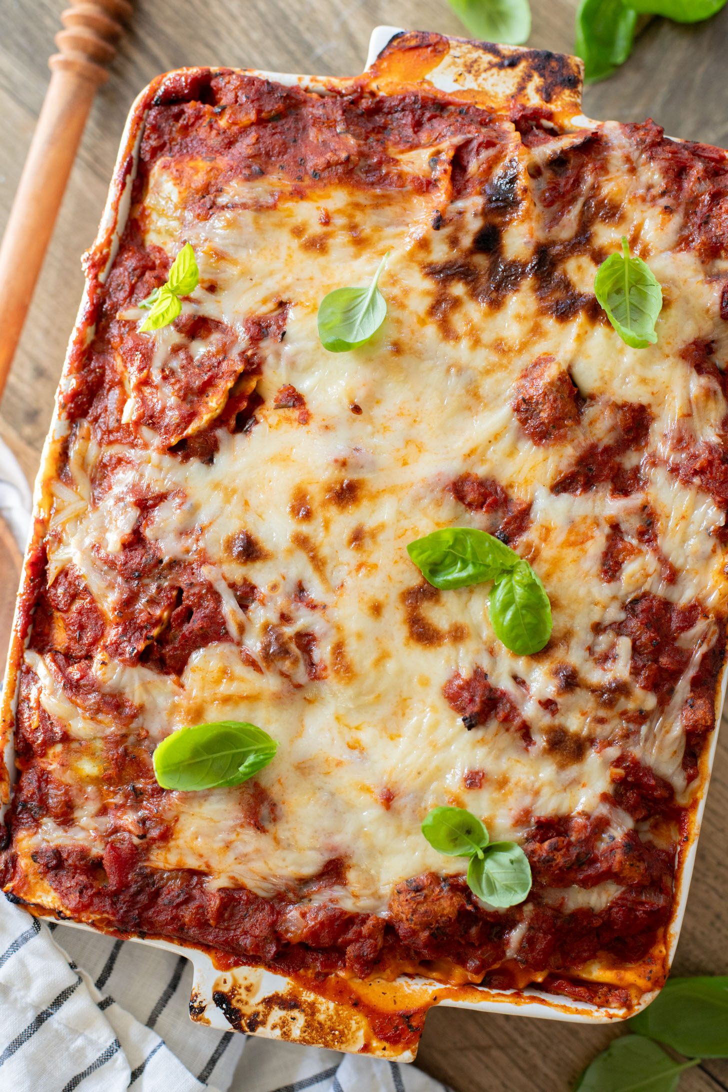 This Ravioli Lasagna is the ultimate family dinner! It is easy to assemble, feeds a crowd and is 100% dairy-free | ThisSavoryVegan.com