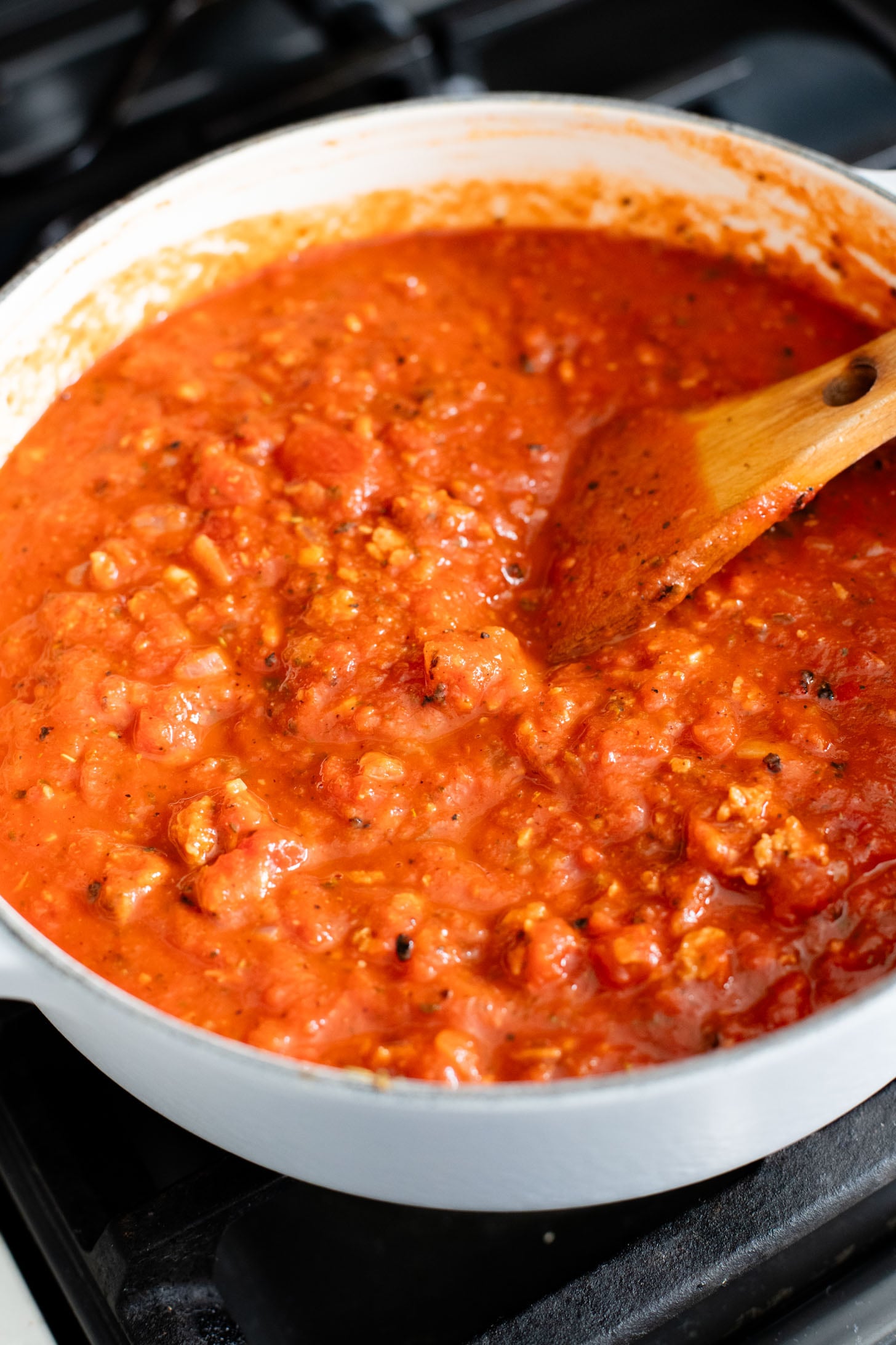 This Ravioli Lasagna is the ultimate family dinner! It is easy to assemble, feeds a crowd and is 100% dairy-free | ThisSavoryVegan.com