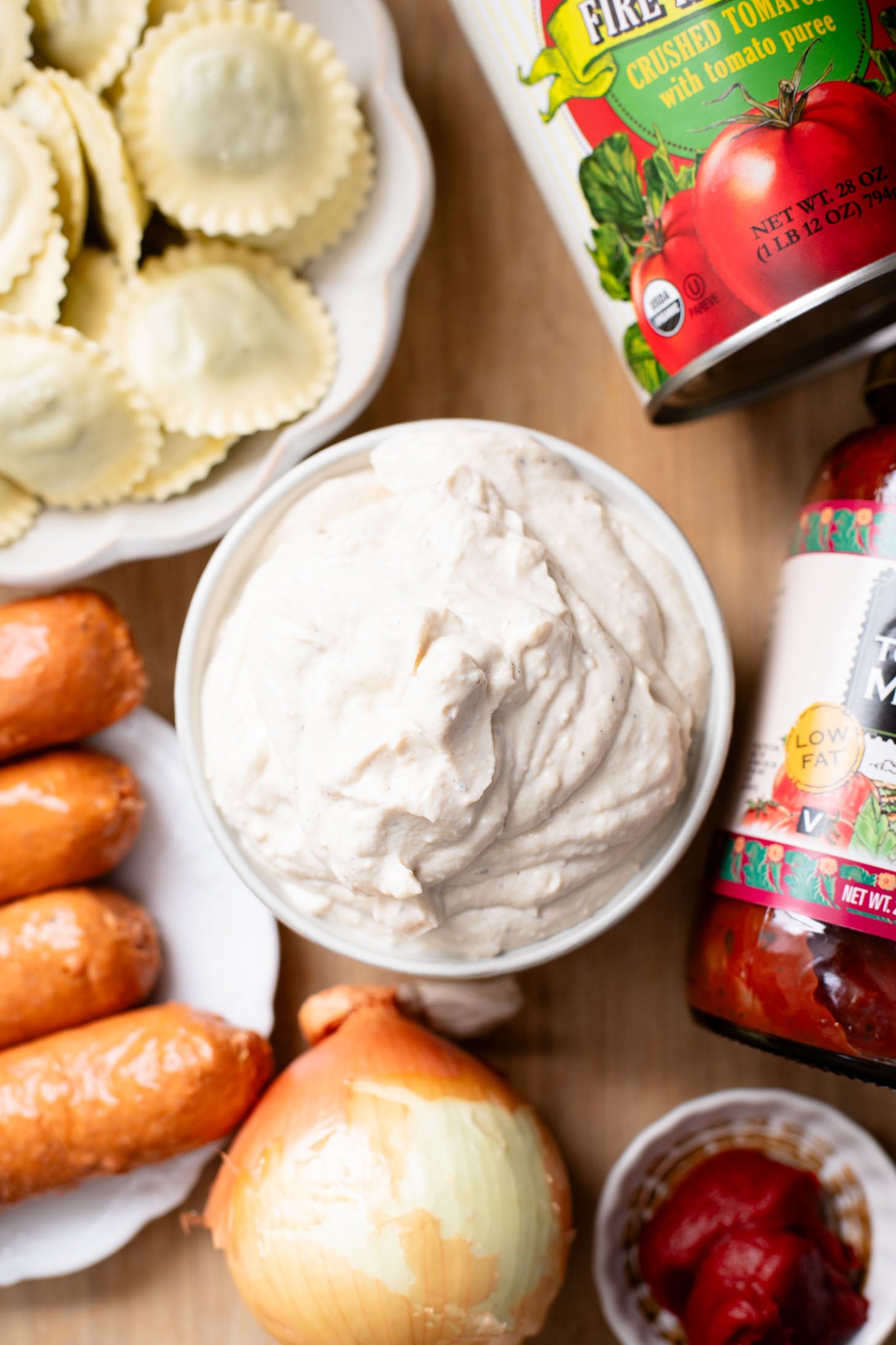 This Ravioli Lasagna is the ultimate family dinner! It is easy to assemble, feeds a crowd and is 100% dairy-free | ThisSavoryVegan.com