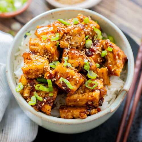 This Sweet Chili Tofu is a 20 minute dinner that is way better than takeout. The tofu is crispy and the sauce is delicious | ThisSavoryVegan.com