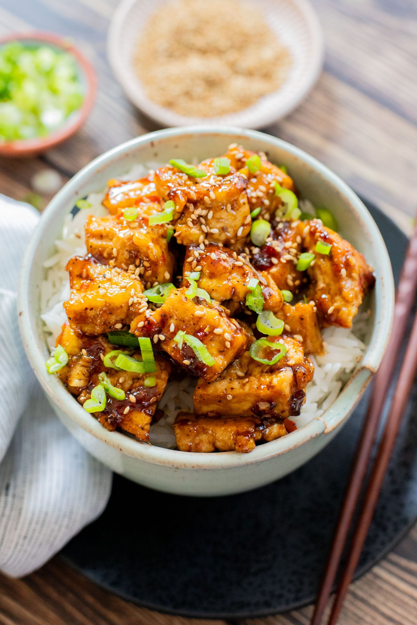 This Sweet Chili Tofu is a 20 minute dinner that is way better than takeout. The tofu is crispy and the sauce is delicious | ThisSavoryVegan.com