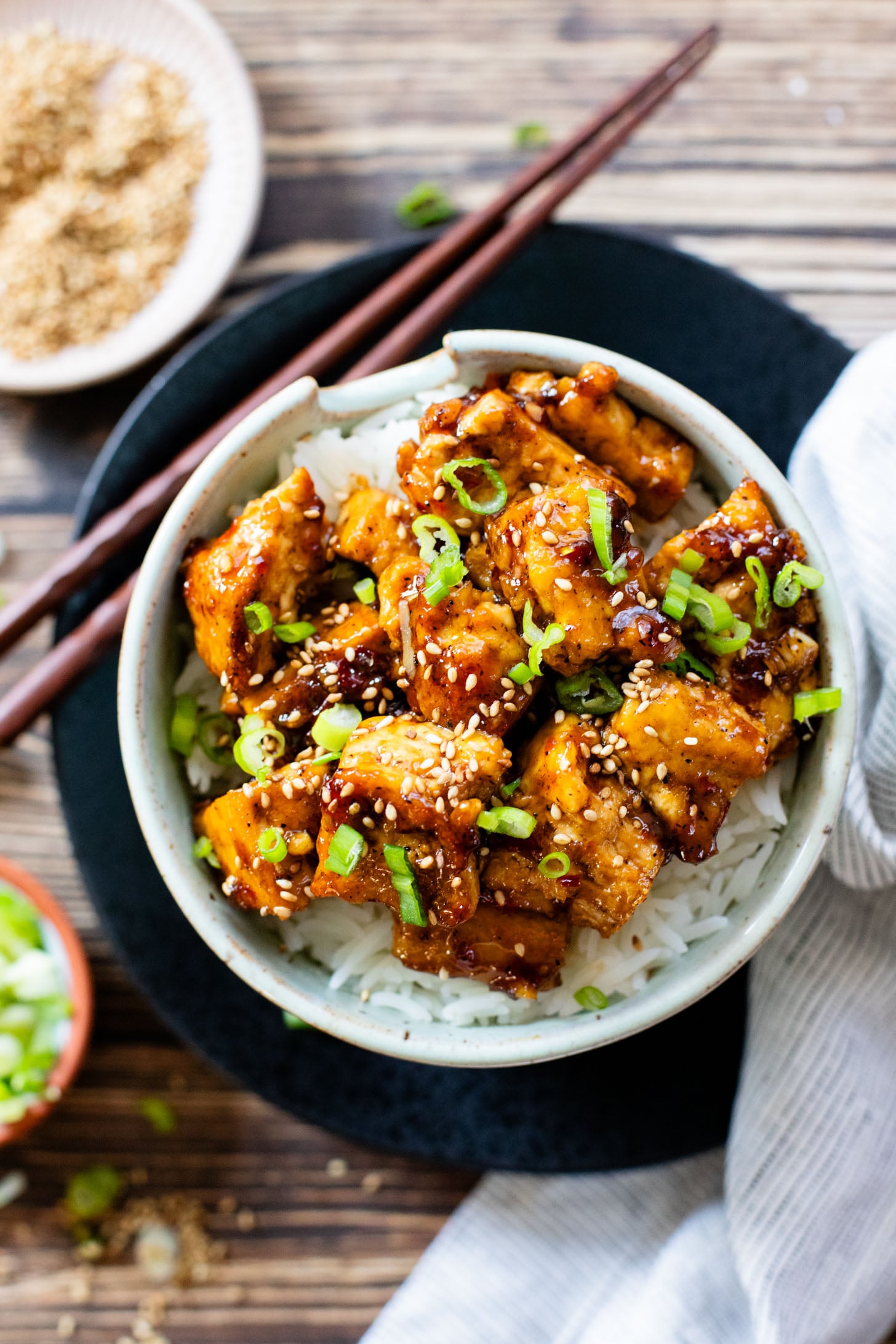 This Sweet Chili Tofu is a 20 minute dinner that is way better than takeout. The tofu is crispy and the sauce is delicious | ThisSavoryVegan.com
