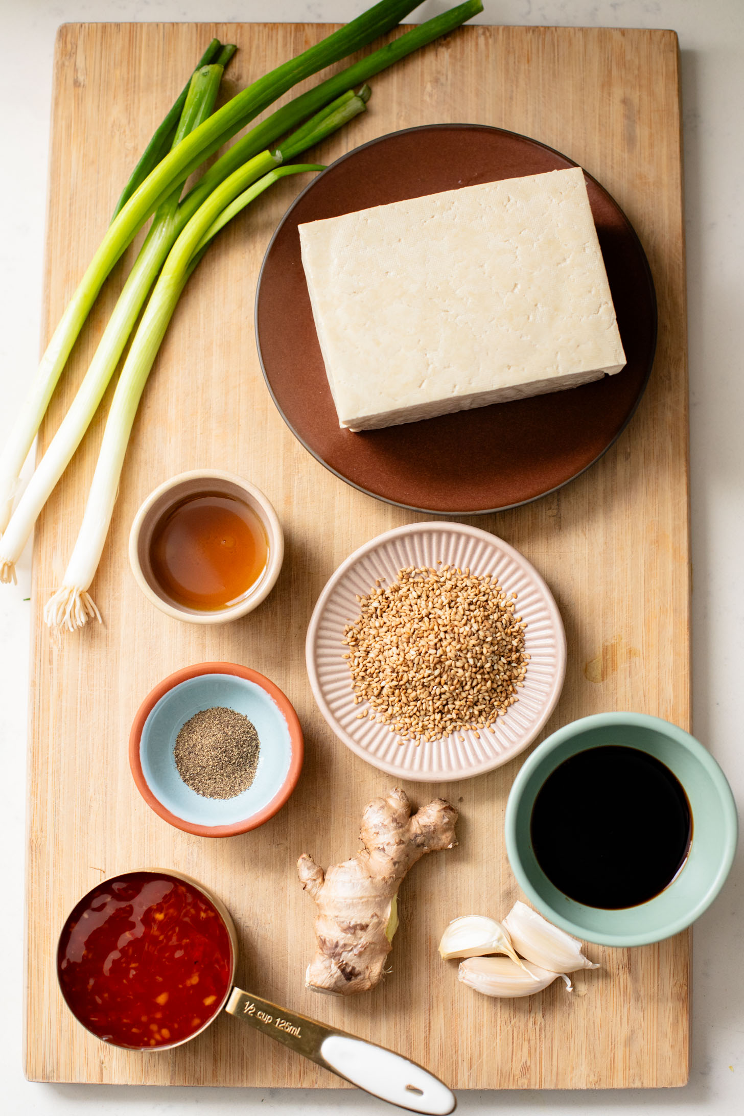 This Sweet Chili Tofu is a 20 minute dinner that is way better than takeout. The tofu is crispy and the sauce is delicious | ThisSavoryVegan.com