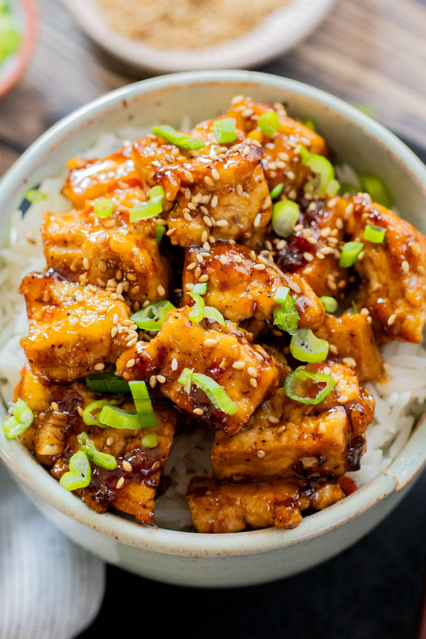 This Sweet Chili Tofu is a 20 minute dinner that is way better than takeout. The tofu is crispy and the sauce is delicious | ThisSavoryVegan.com
