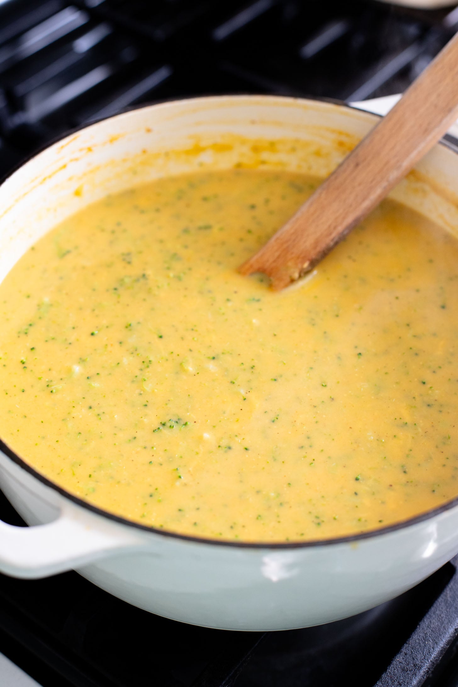 This Vegan Broccoli & Cheddar Soup is creamy & delicious. Made dairy-free and has some extra sneaky veggies too | ThisSavoryVegan.com