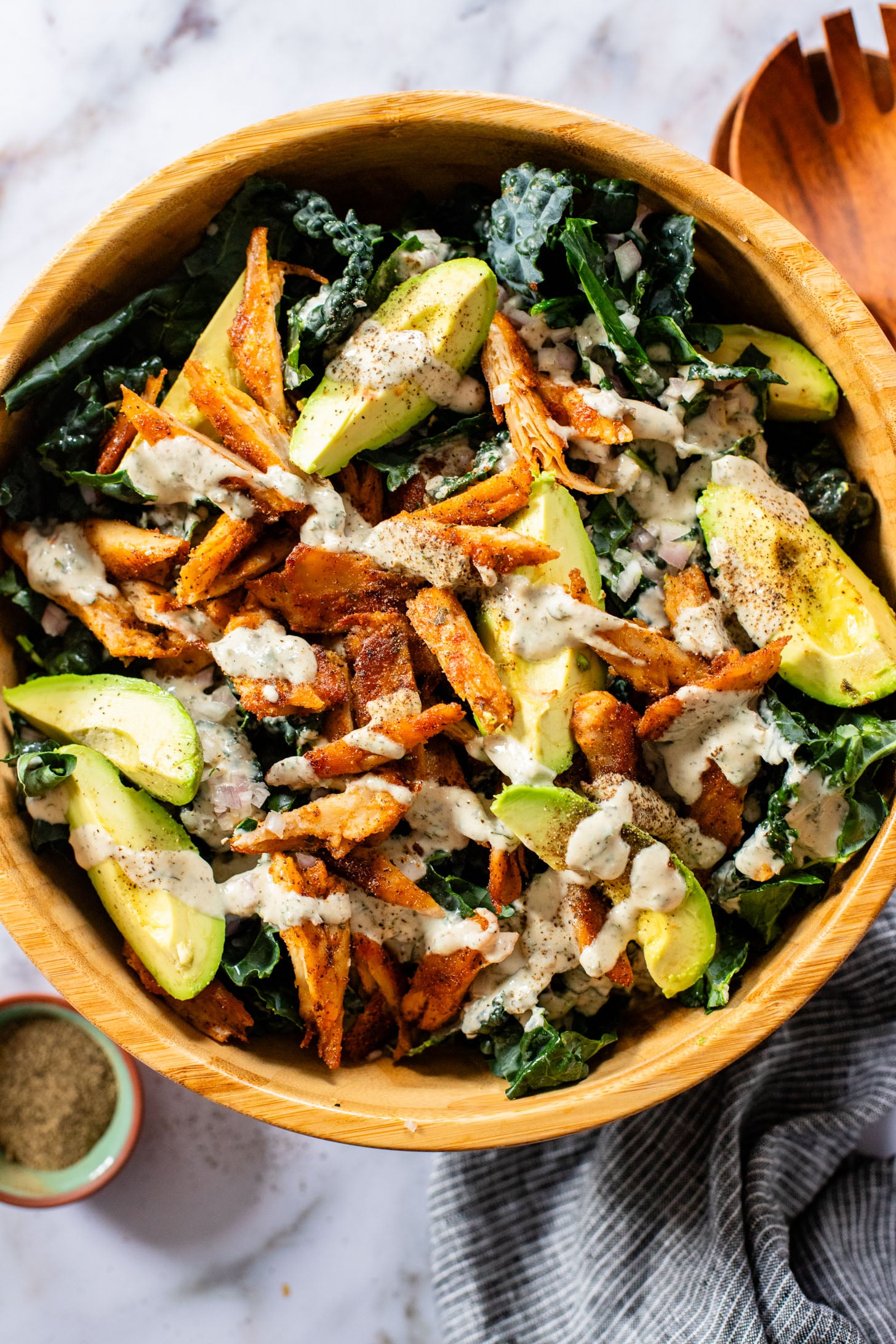 This Vegan Chicken Avocado Kale Salad is made with crisp veggies, charred vegan chicken and the best tahini ranch | ThisSavoryVegan.com