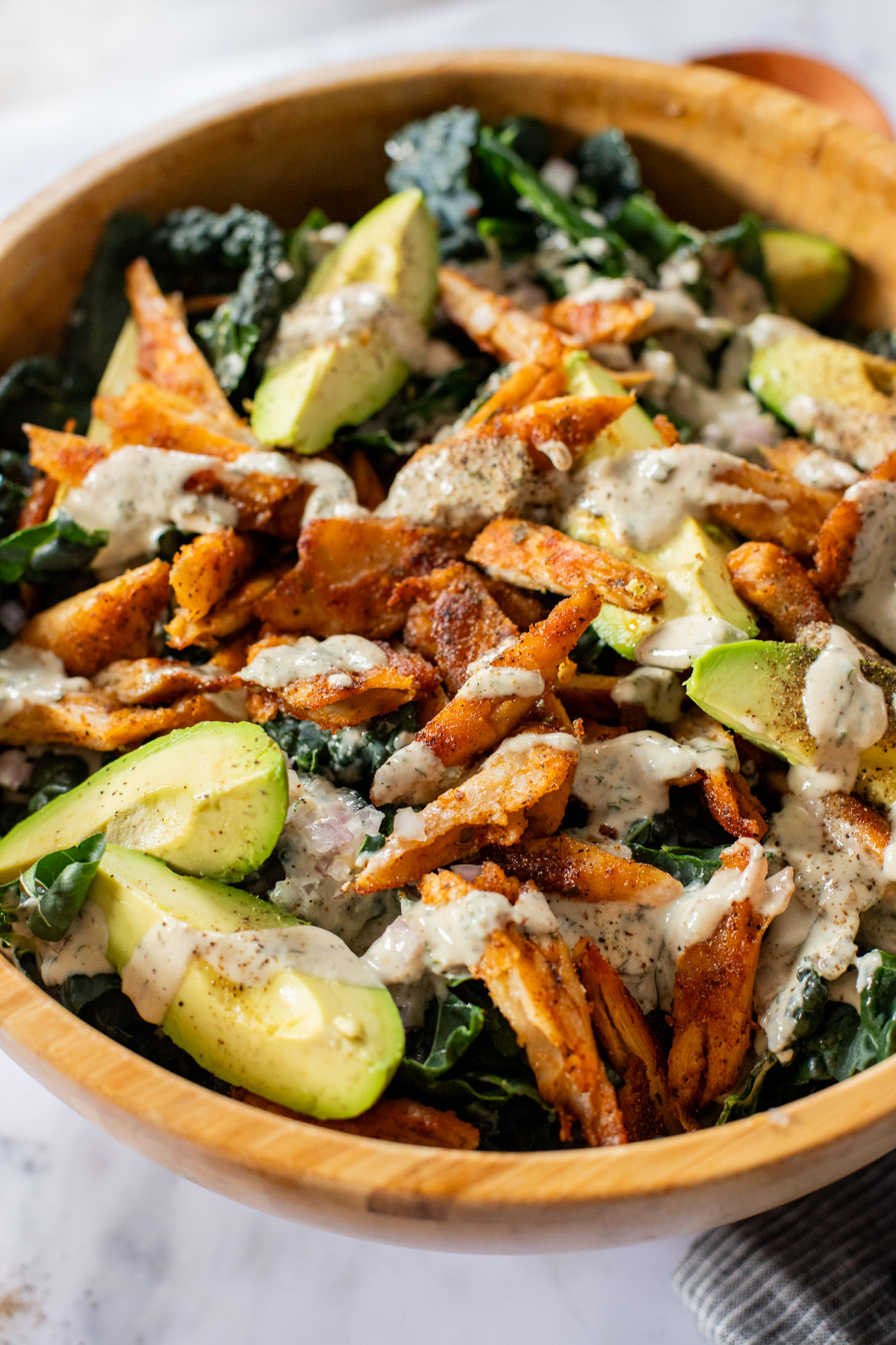This Vegan Chicken Avocado Kale Salad is made with crisp veggies, charred vegan chicken and the best tahini ranch | ThisSavoryVegan.com
