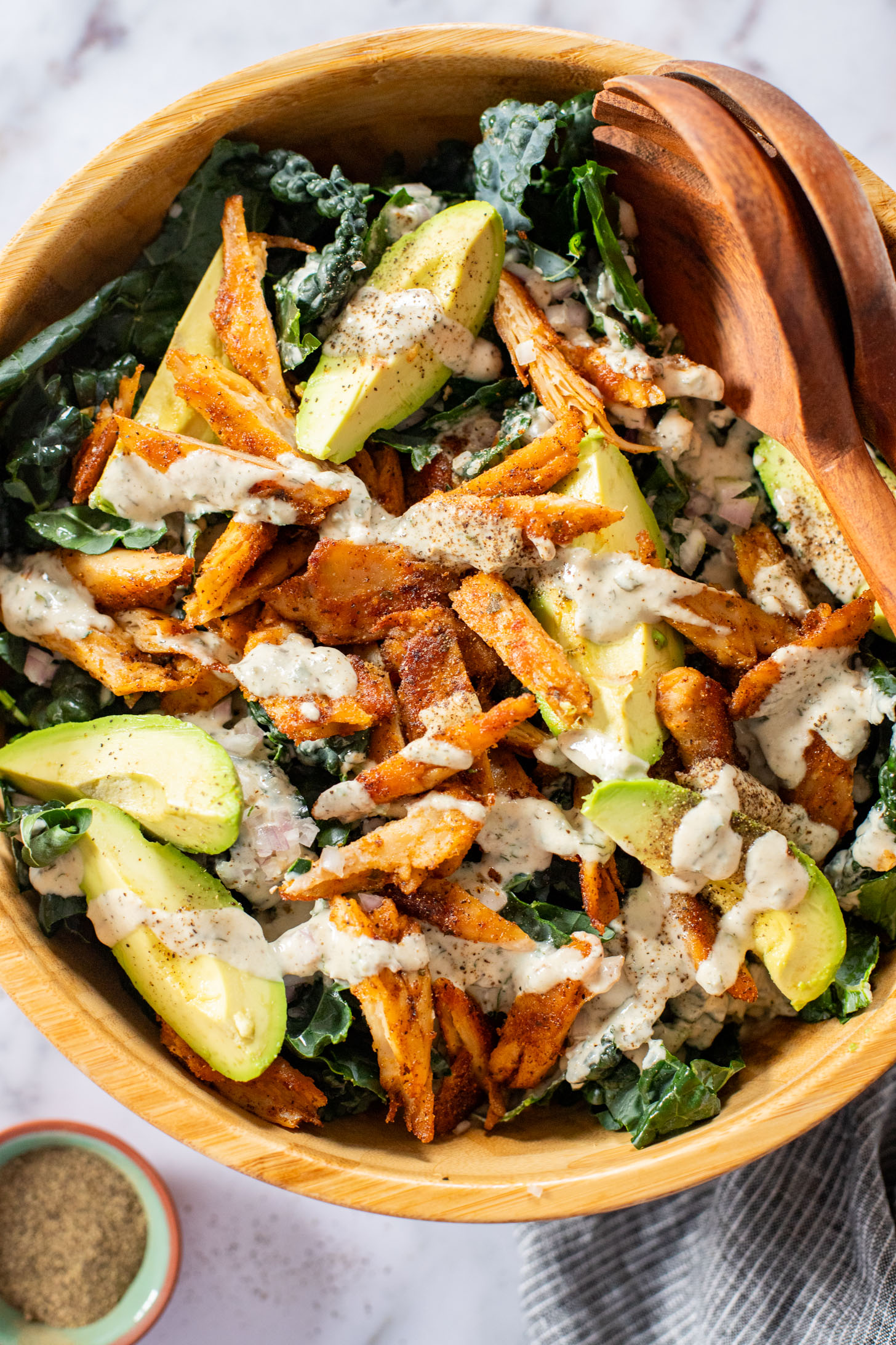 This Vegan Chicken Avocado Kale Salad is made with crisp veggies, charred vegan chicken and the best tahini ranch | ThisSavoryVegan.com