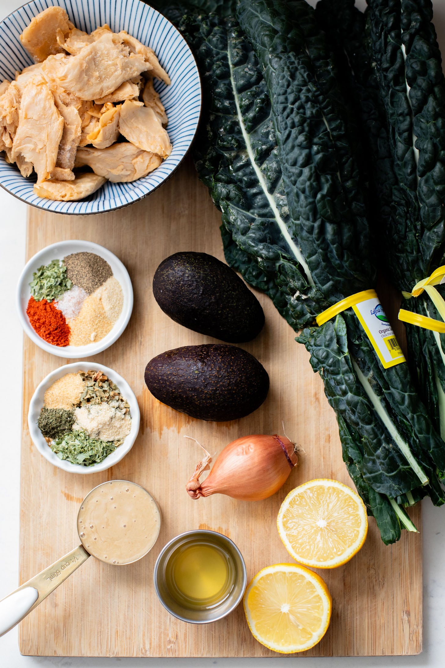 This Vegan Chicken Avocado Kale Salad is made with crisp veggies, charred vegan chicken and the best tahini ranch | ThisSavoryVegan.com