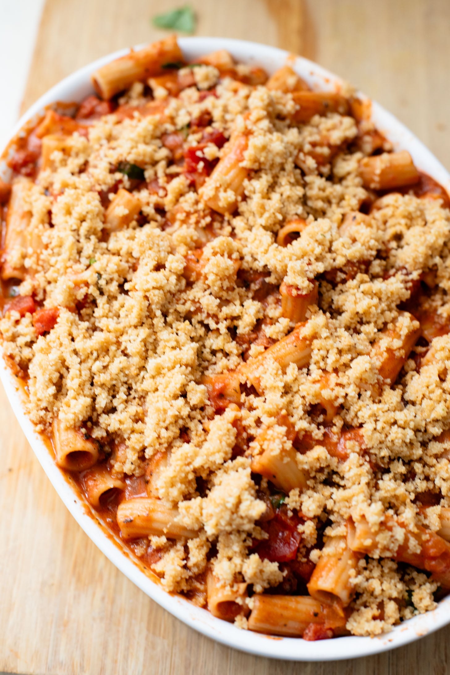 This Baked Rigatoni with Garlic Bread Crumbs is a comforting casserole. Made with simple plant-based ingredients for a delicious, hearty meal | ThisSavoryVegan.com