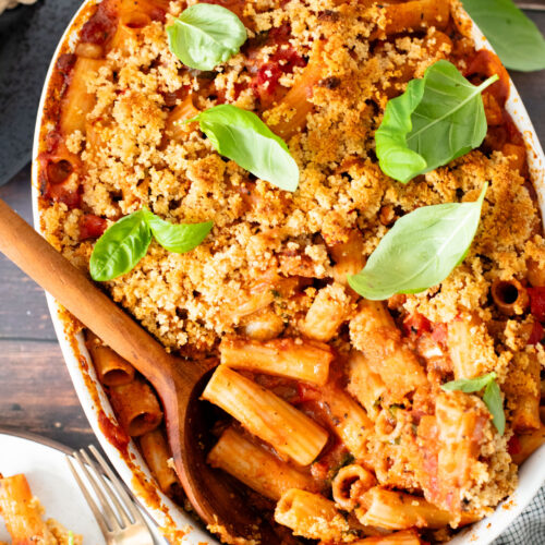 This Baked Rigatoni with Garlic Bread Crumbs is a comforting casserole. Made with simple plant-based ingredients for a delicious, hearty meal | ThisSavoryVegan.com
