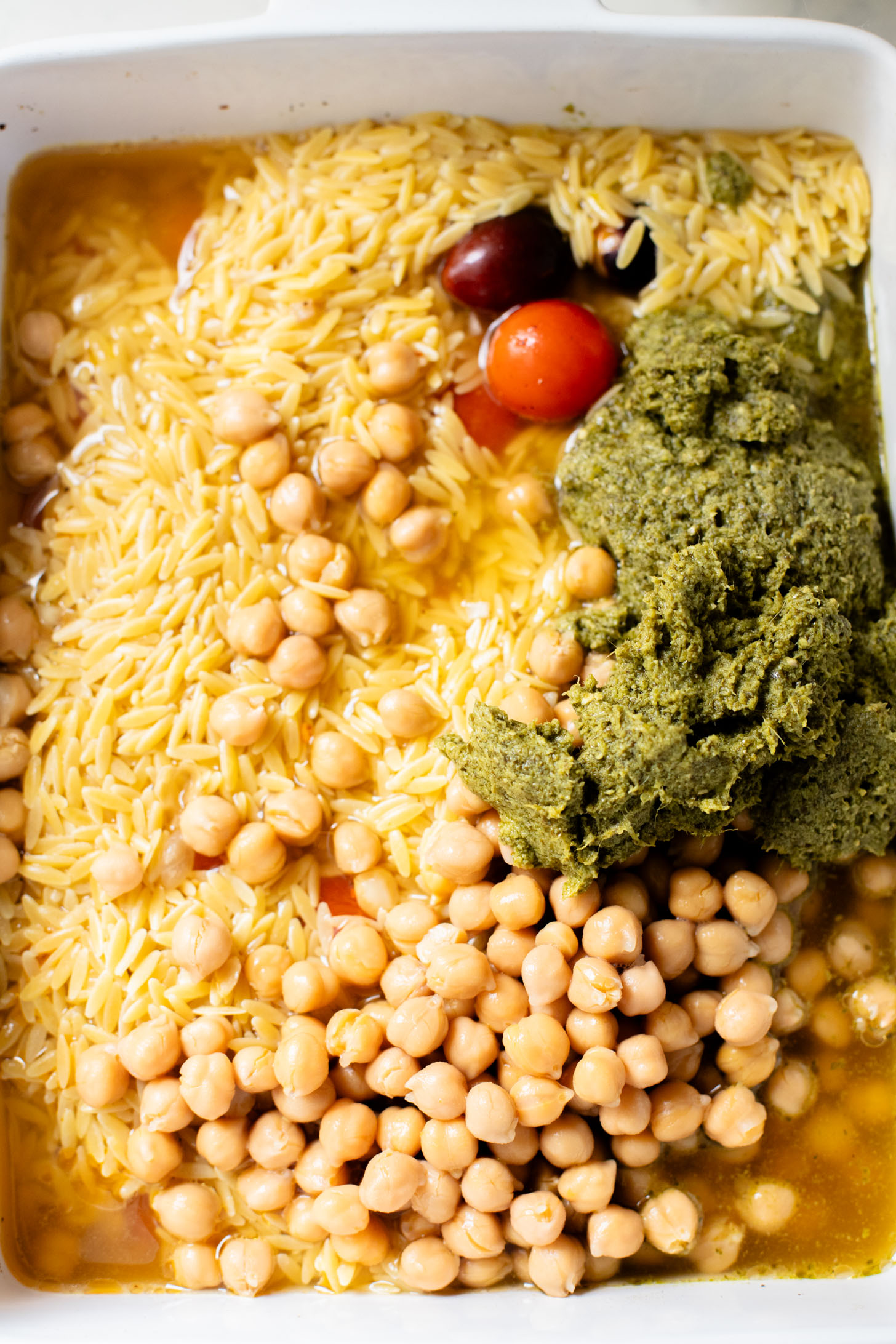 This Pesto Orzo Chickpea Bake is the perfect one pot vegan casserole! Ready in 40 minutes and so delicious | ThisSavoryVegan.com