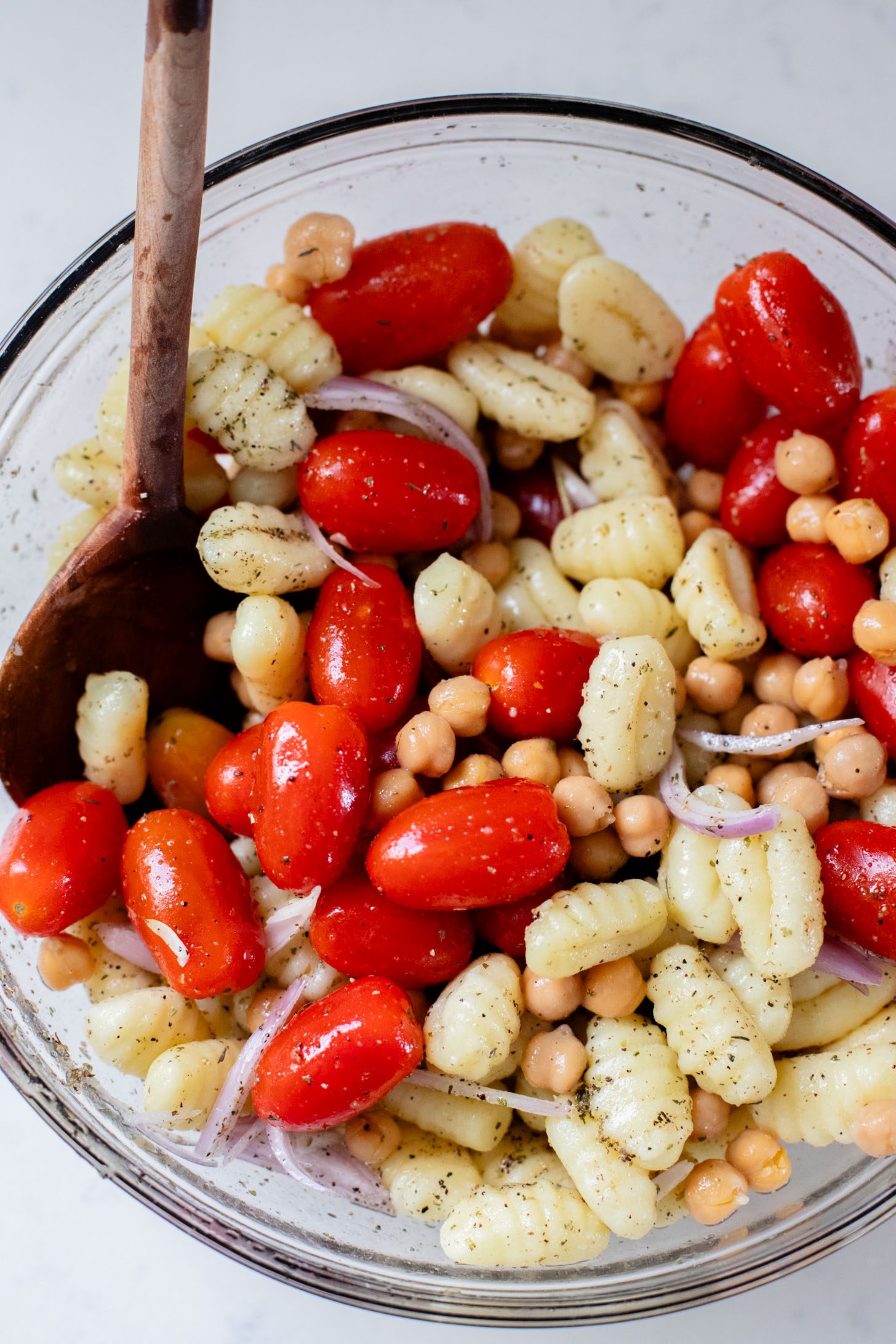 This Sheet Pan Gnocchi & Chickpeas recipe is perfect for a weeknight dinner. Everything is made on one baking sheet and is ready in 30 minutes | ThisSavoryVegan.com