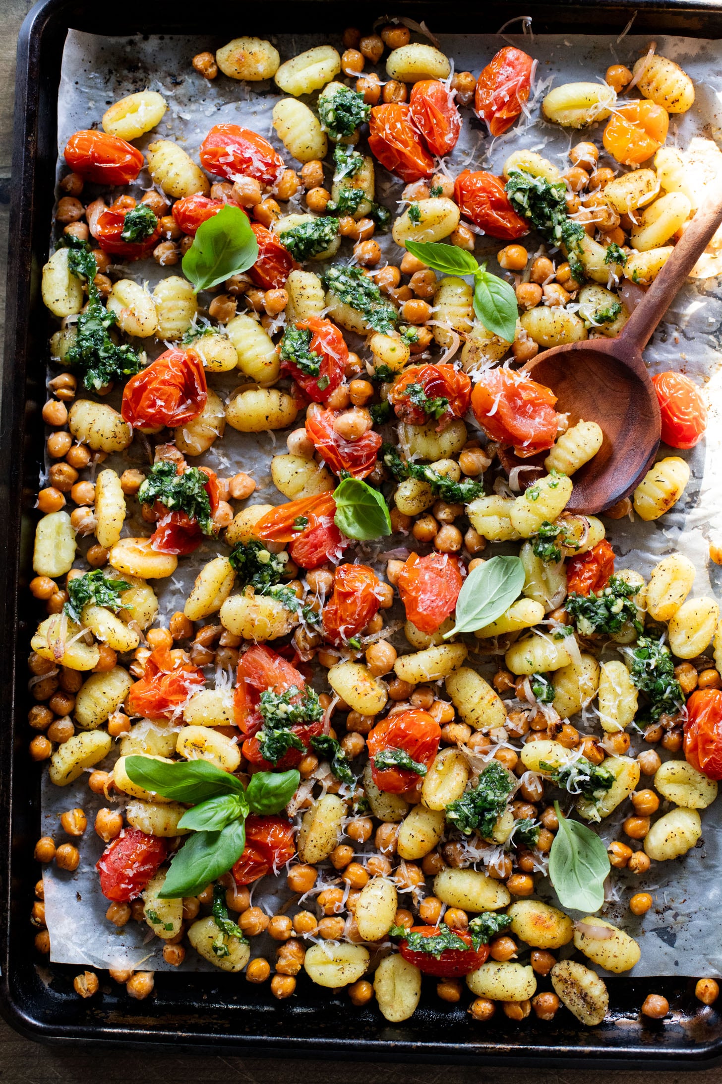 This Sheet Pan Gnocchi & Chickpeas recipe is perfect for a weeknight dinner. Everything is made on one baking sheet and is ready in 30 minutes | ThisSavoryVegan.com
