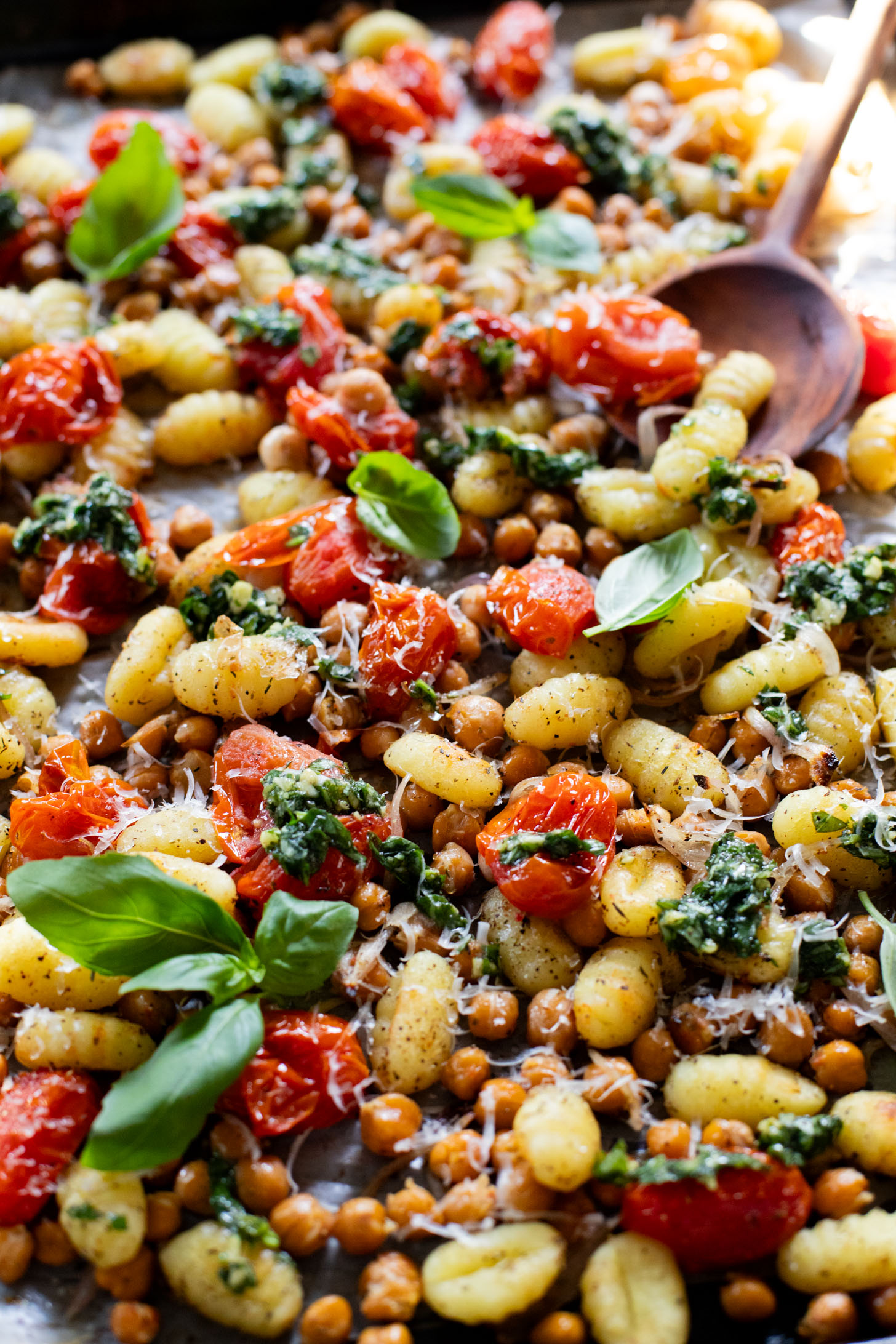 This Sheet Pan Gnocchi & Chickpeas recipe is perfect for a weeknight dinner. Everything is made on one baking sheet and is ready in 30 minutes | ThisSavoryVegan.com