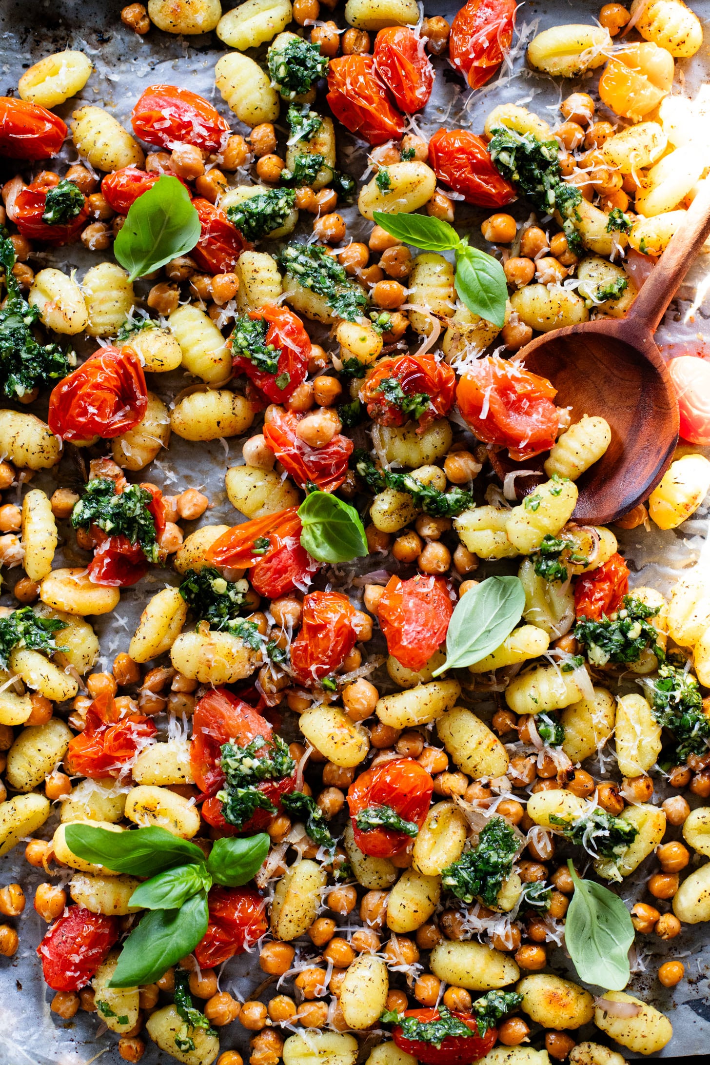 This Sheet Pan Gnocchi & Chickpeas recipe is perfect for a weeknight dinner. Everything is made on one baking sheet and is ready in 30 minutes | ThisSavoryVegan.com