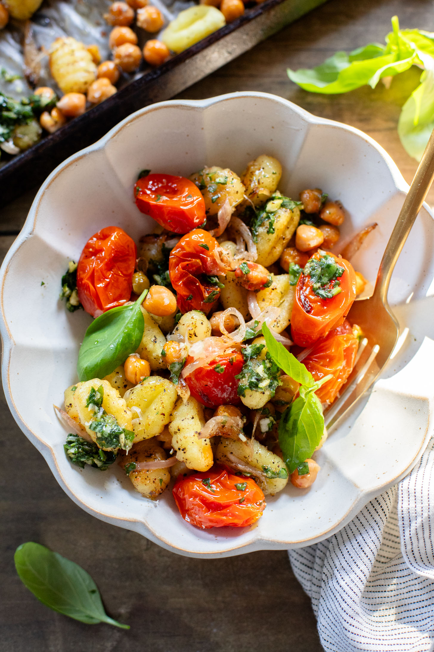 This Sheet Pan Gnocchi & Chickpeas recipe is perfect for a weeknight dinner. Everything is made on one baking sheet and is ready in 30 minutes | ThisSavoryVegan.com