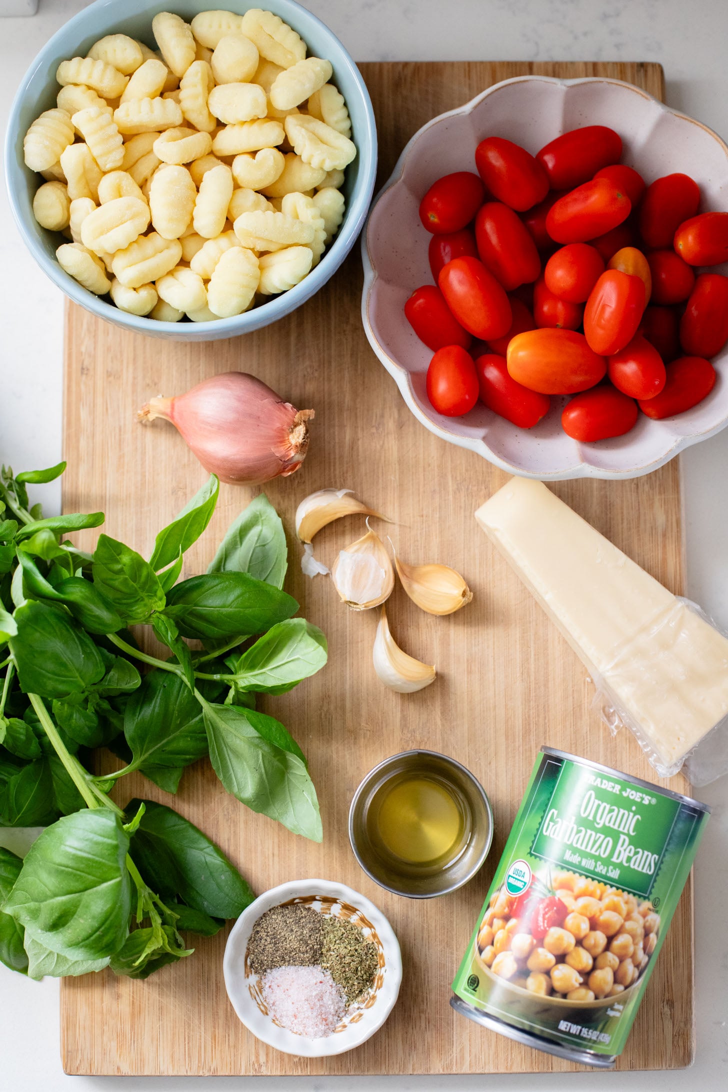 This Sheet Pan Gnocchi & Chickpeas recipe is perfect for a weeknight dinner. Everything is made on one baking sheet and is ready in 30 minutes | ThisSavoryVegan.com