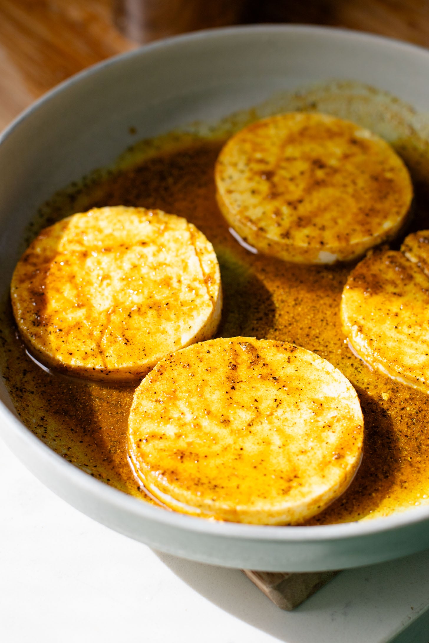 These Tofu Breakfast Sandwiches are the perfect breakfast on the go. Layered with seasoned tofu, tempeh bacon and spinach | ThisSavoryVegan.com