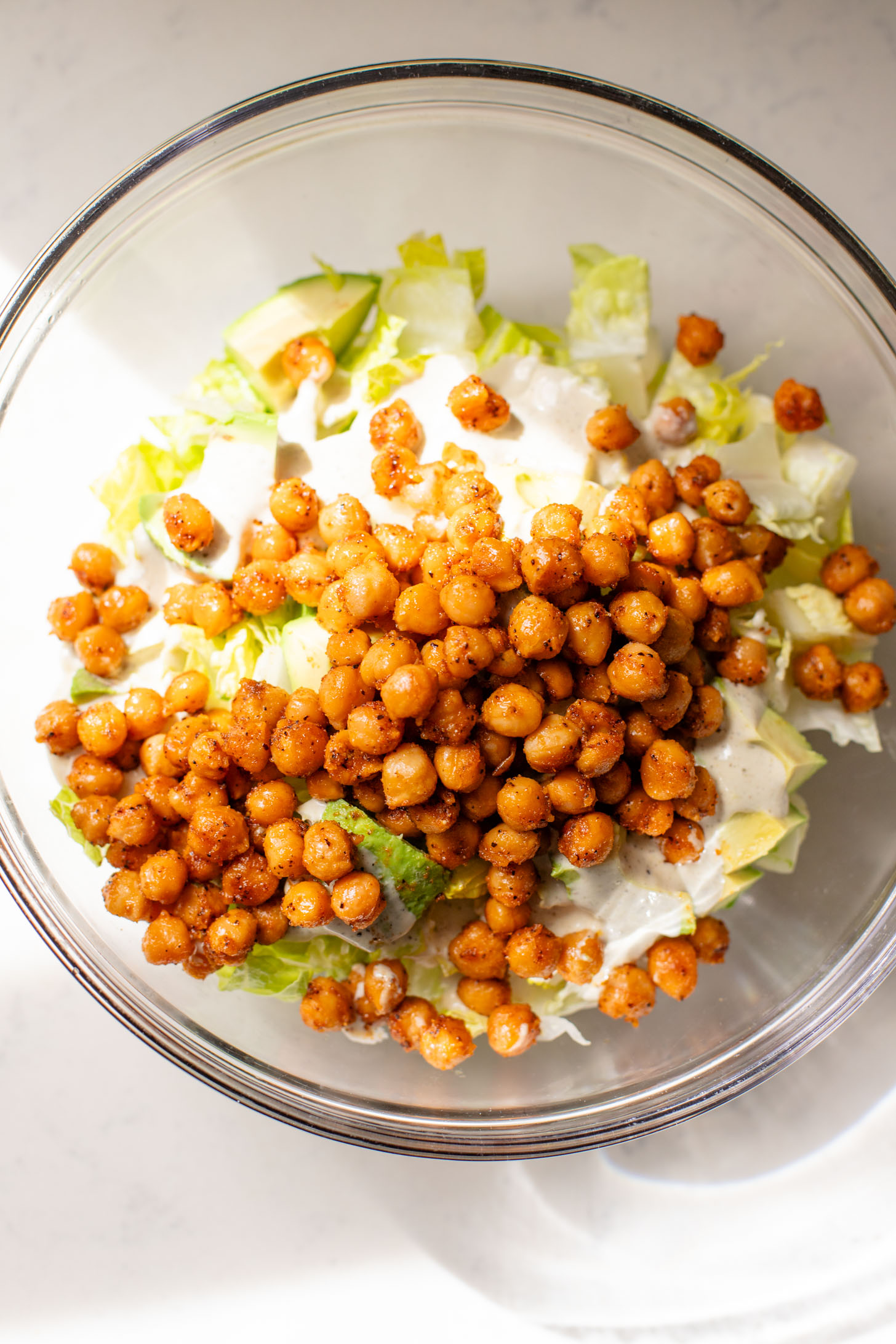 These Chickpea Caesar Salad Pitas are the perfect quick lunch or dinner! Made with the BEST dairy-free Caesar dressing | ThisSavoryVegan.com