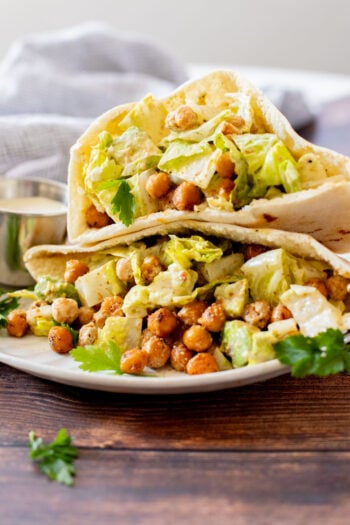 These Chickpea Caesar Salad Pitas are the perfect quick lunch or dinner! Made with the BEST dairy-free Caesar dressing | ThisSavoryVegan.com