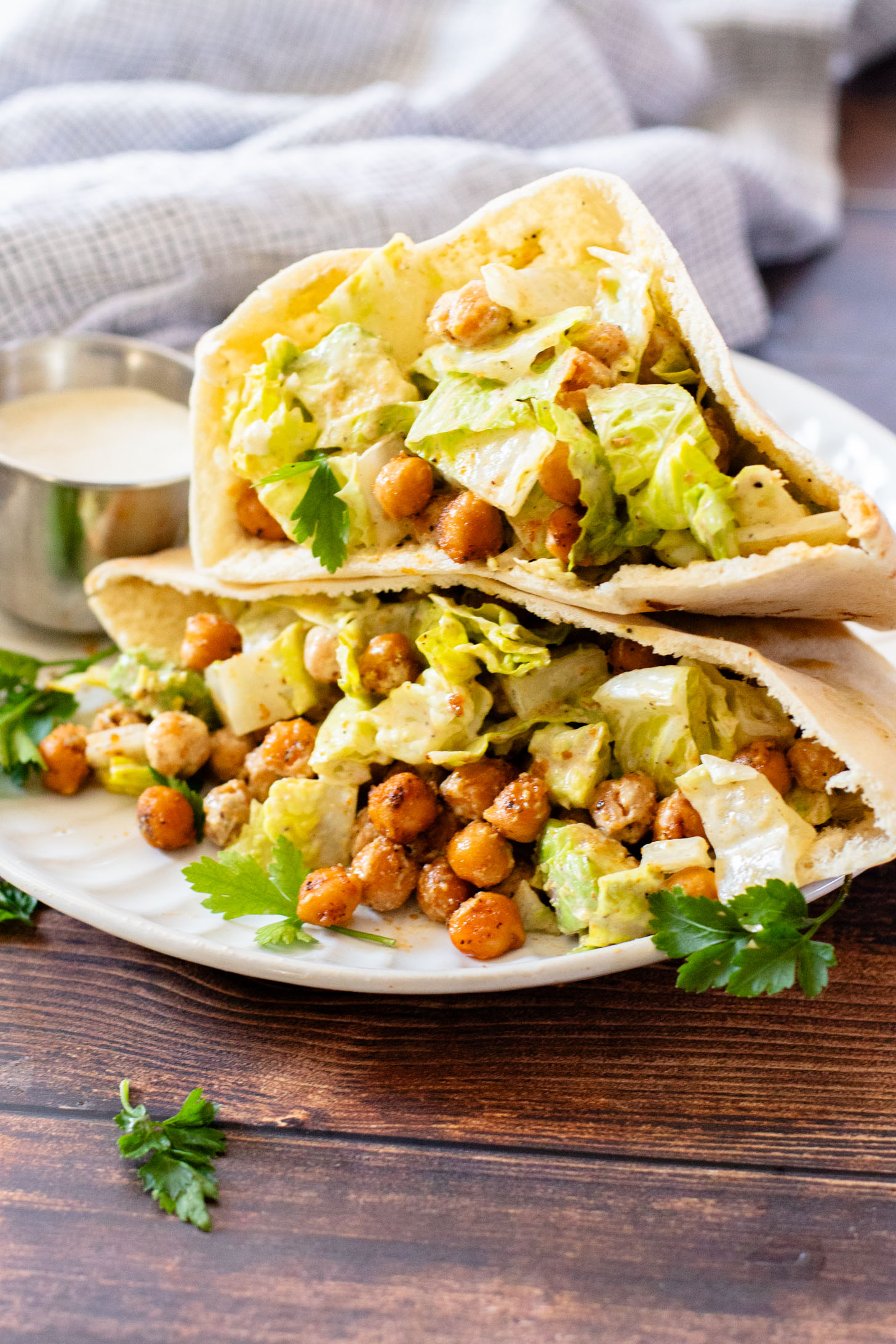These Chickpea Caesar Salad Pitas are the perfect quick lunch or dinner! Made with the BEST dairy-free Caesar dressing | ThisSavoryVegan.com