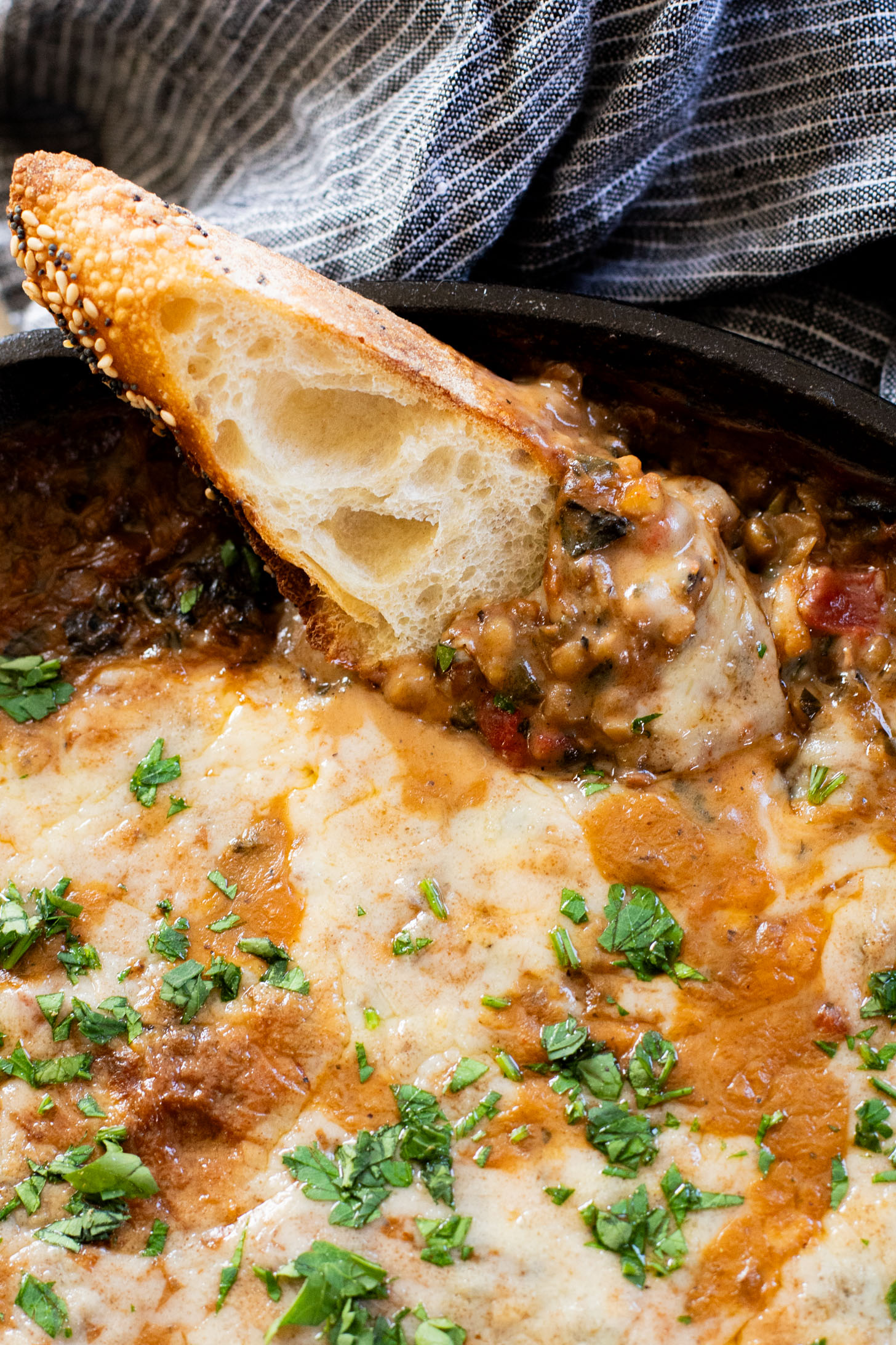 This Lentil & Spinach Skillet is an easy and delicious one-pot dinner that is ready in under an hour! Perfect family dinner | ThisSavoryVegan.com