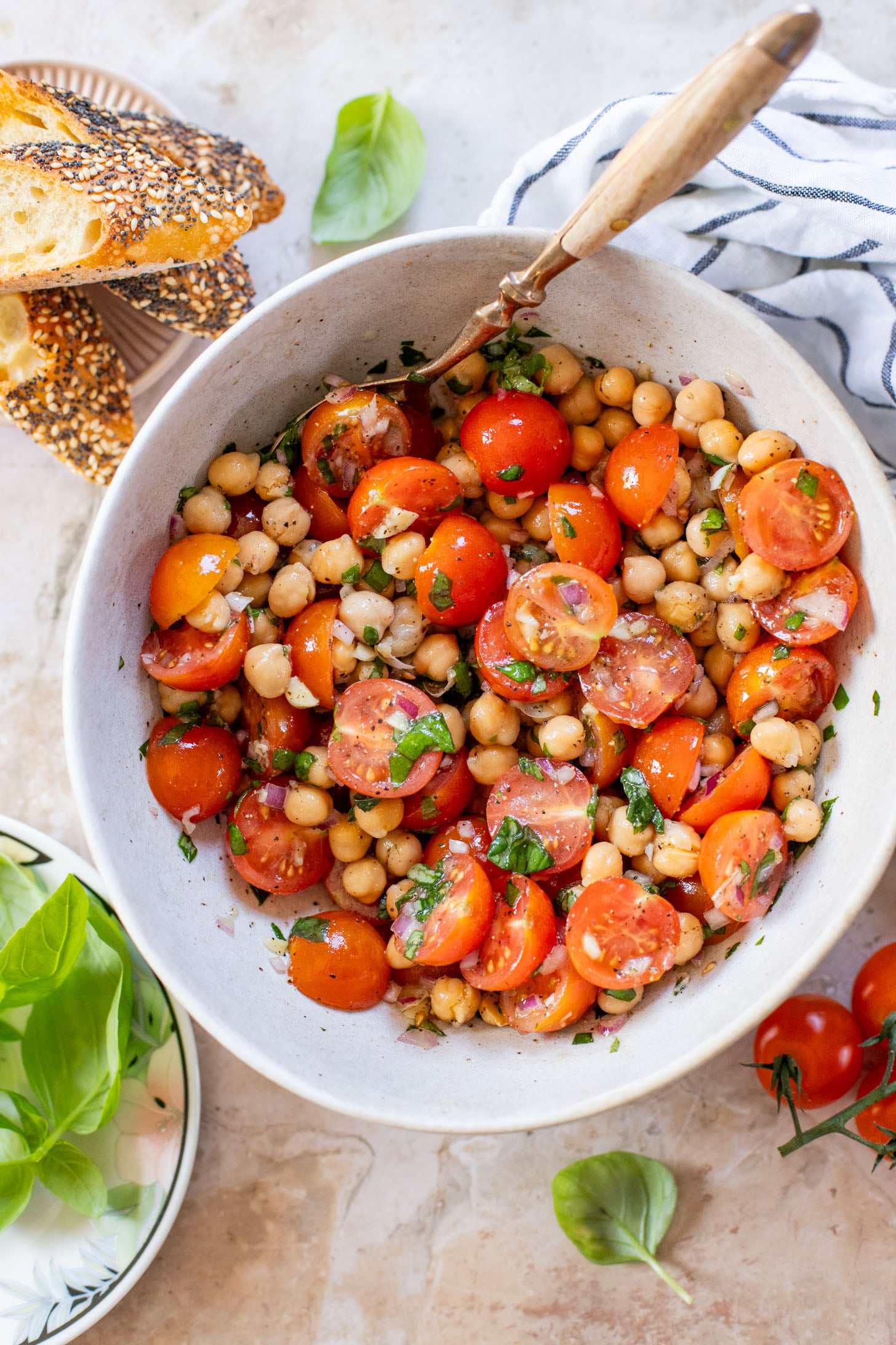 This Tomato & Chickpea Salad is a bright & fresh salad recipe that is perfect for a quick lunch! Best served with toasted bread | ThisSavoryVegan.com
