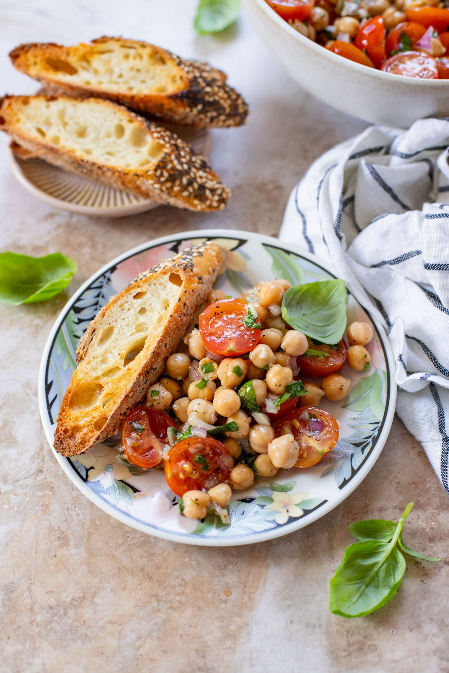 This Tomato & Chickpea Salad is a bright & fresh salad recipe that is perfect for a quick lunch! Best served with toasted bread | ThisSavoryVegan.com