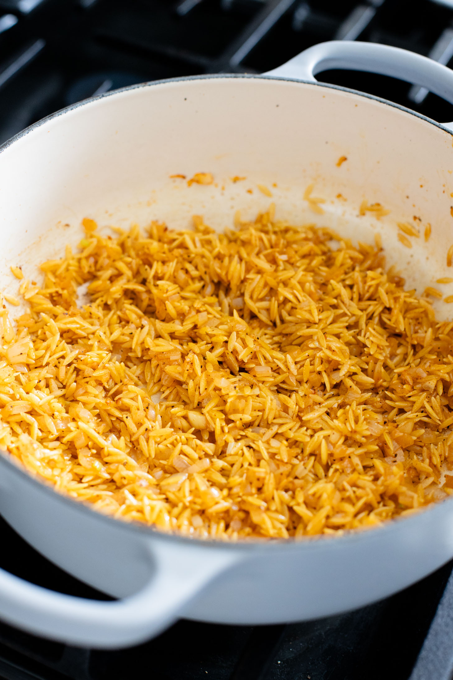 This Vegan Broccoli Cheddar Orzo is a creamy & cozy weeknight dinner that is 100% dairy-free and super delicious | ThisSavoryVegan.com