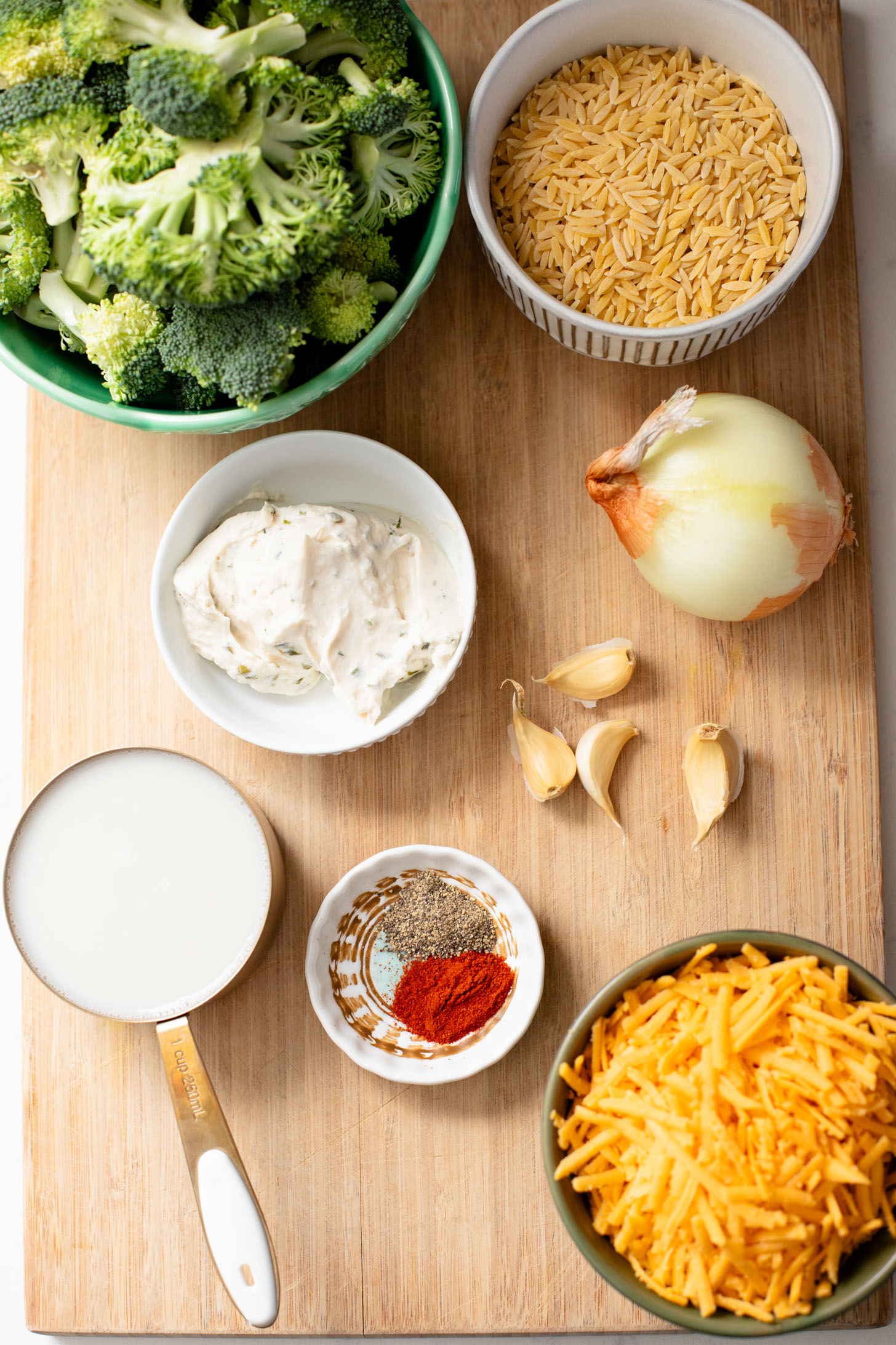 This Vegan Broccoli Cheddar Orzo is a creamy & cozy weeknight dinner that is 100% dairy-free and super delicious | ThisSavoryVegan.com