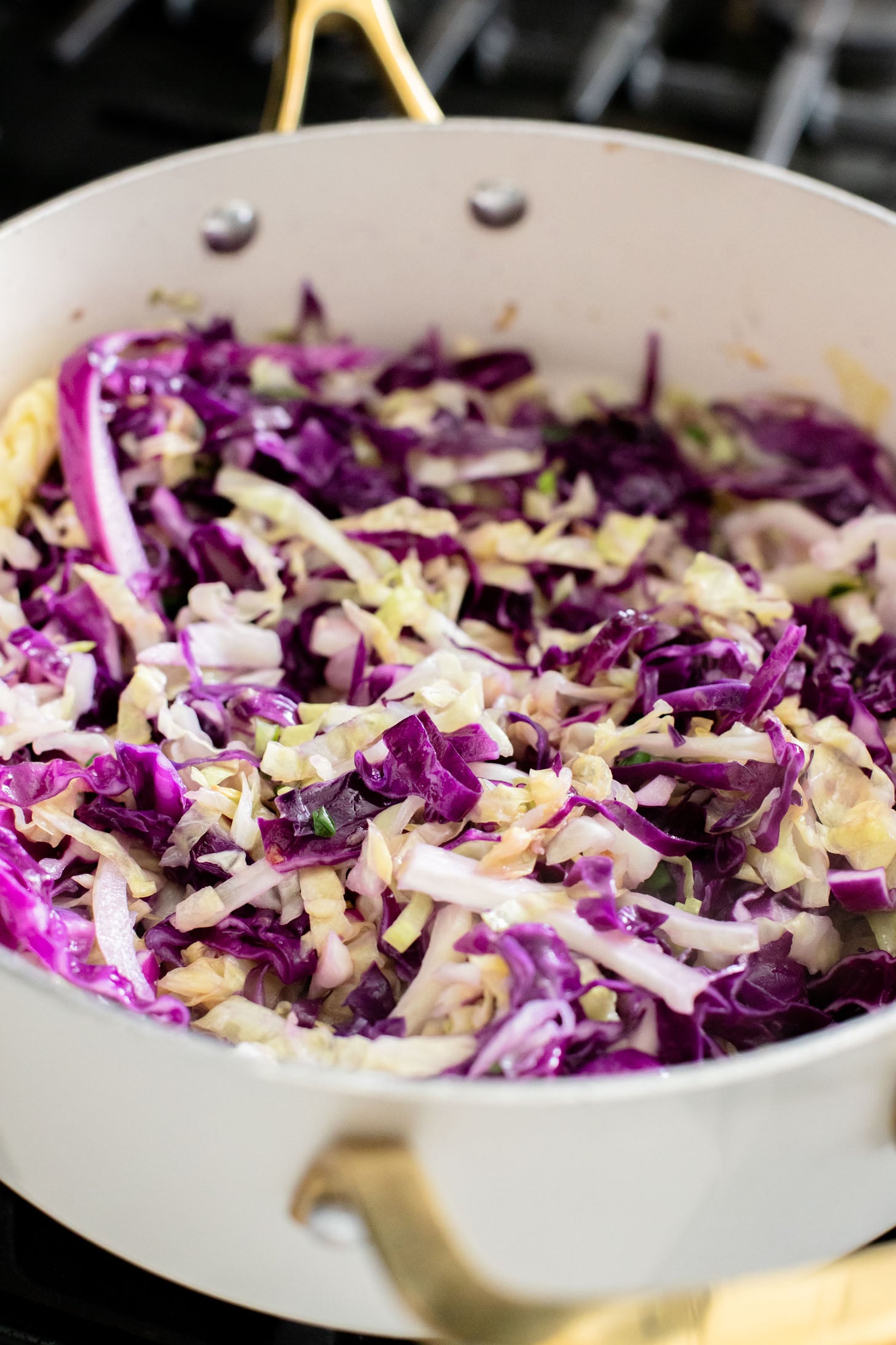This Cabbage and Rice Noodle Stir-Fry is great for a weeknight when you are short on time for dinner. Noddles, veggies & vegan eggs for protein | ThisSavoryVegan.com