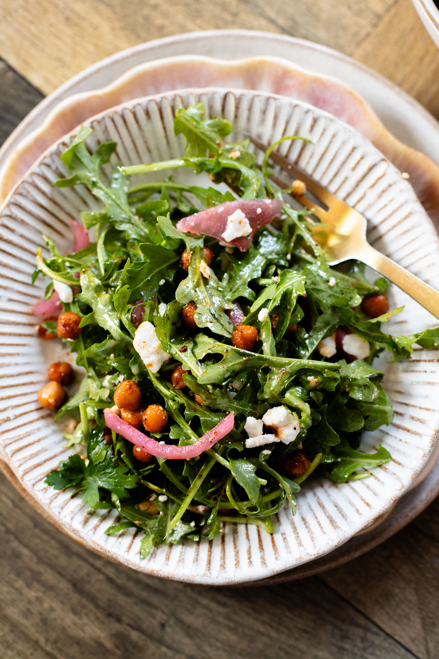 This Crispy Chickpea Arugula Salad is the perfect light, bright & delicious vegan salad. The vegan honey dijon dressing is delish | ThisSavoryVegan.com