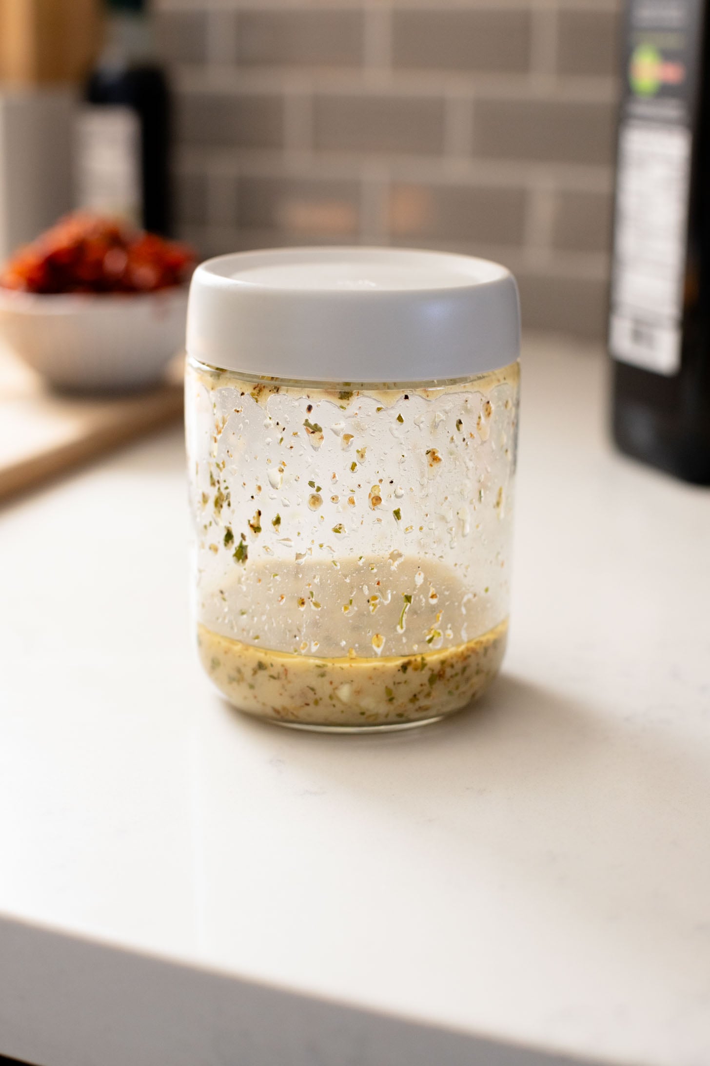 This Roasted Pepper Pasta Salad is simple but packed with flavor. Loaded with pasta, sun-dried tomatoes, roasted peppers and a light dressing | ThisSavoryVegan.com