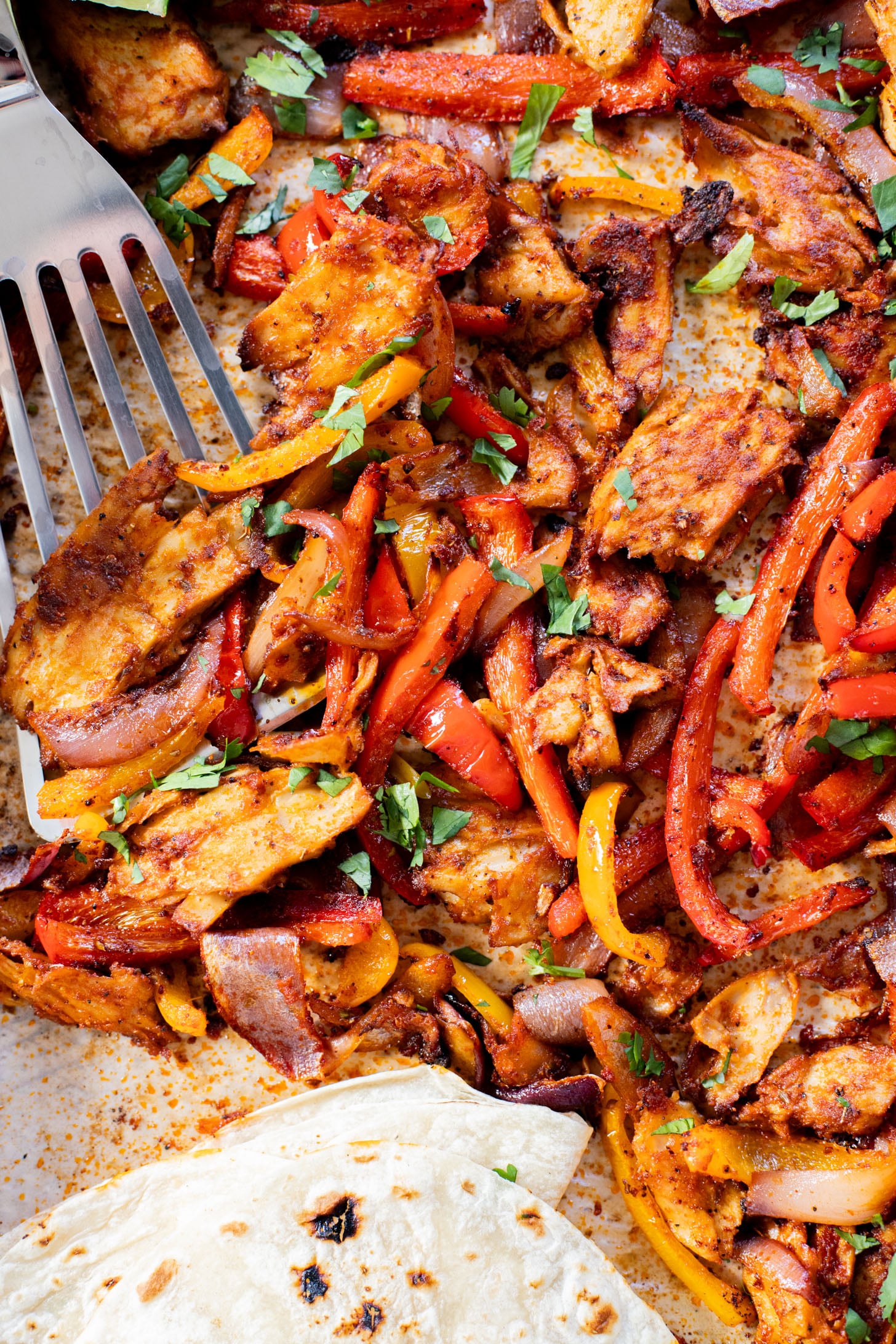 These Sheet Pan Vegan Chicken Fajitas are the perfect easy weeknight dinner. Ready in 30 minutes and made on one sheet pan | ThisSavoryVegan.com