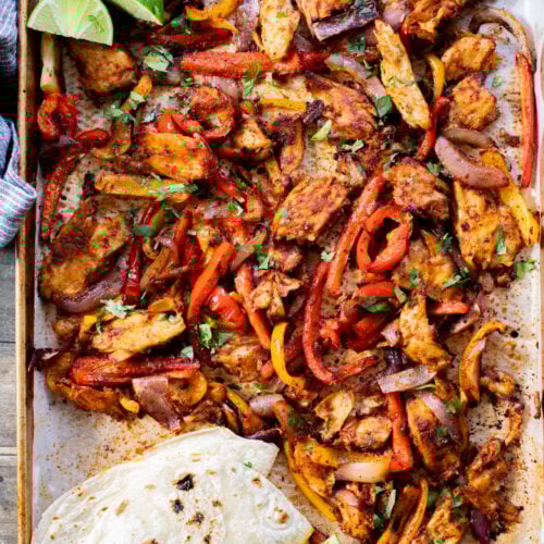 These Sheet Pan Vegan Chicken Fajitas are the perfect easy weeknight dinner. Ready in 30 minutes and made on one sheet pan | ThisSavoryVegan.com