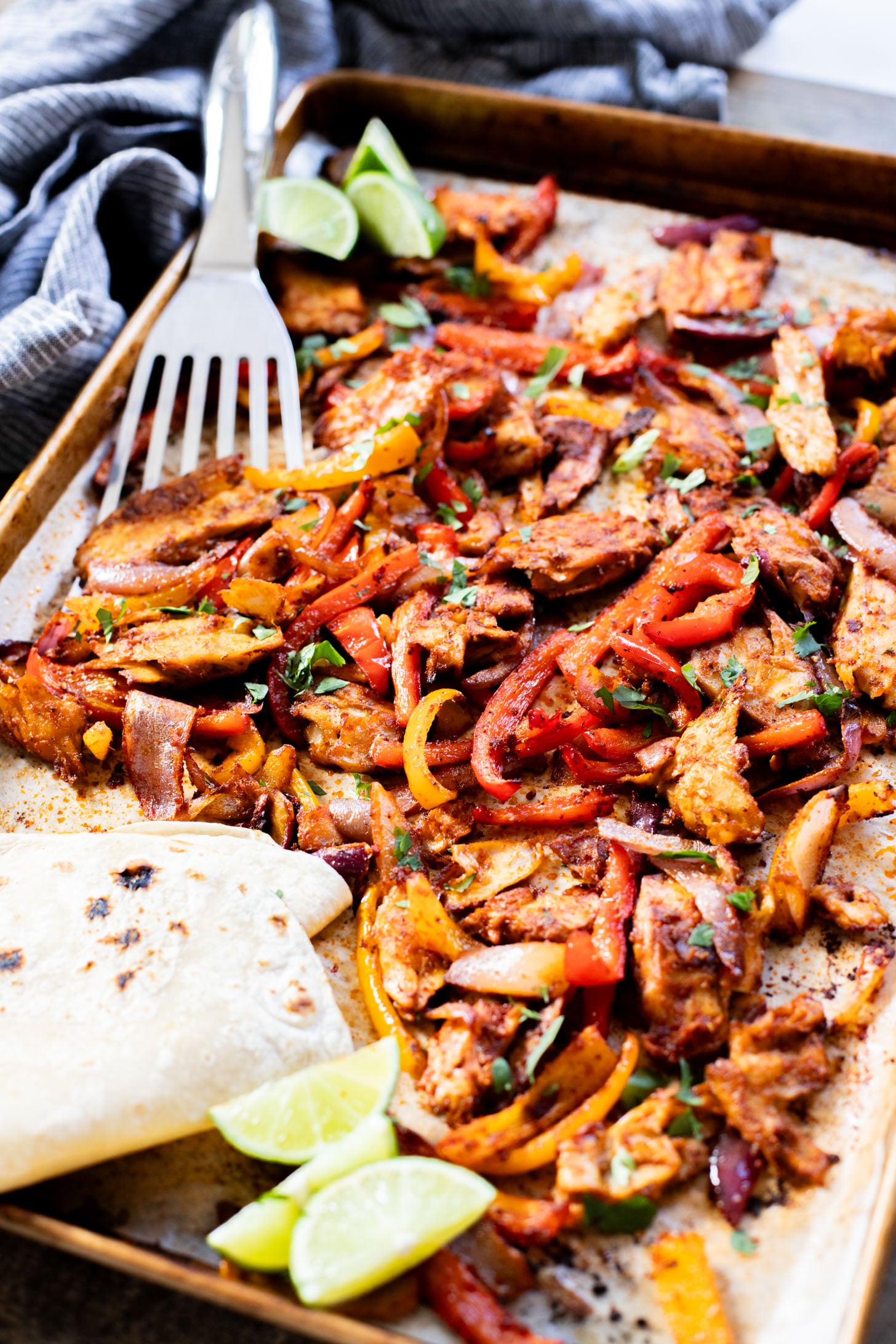 These Sheet Pan Vegan Chicken Fajitas are the perfect easy weeknight dinner. Ready in 30 minutes and made on one sheet pan | ThisSavoryVegan.com