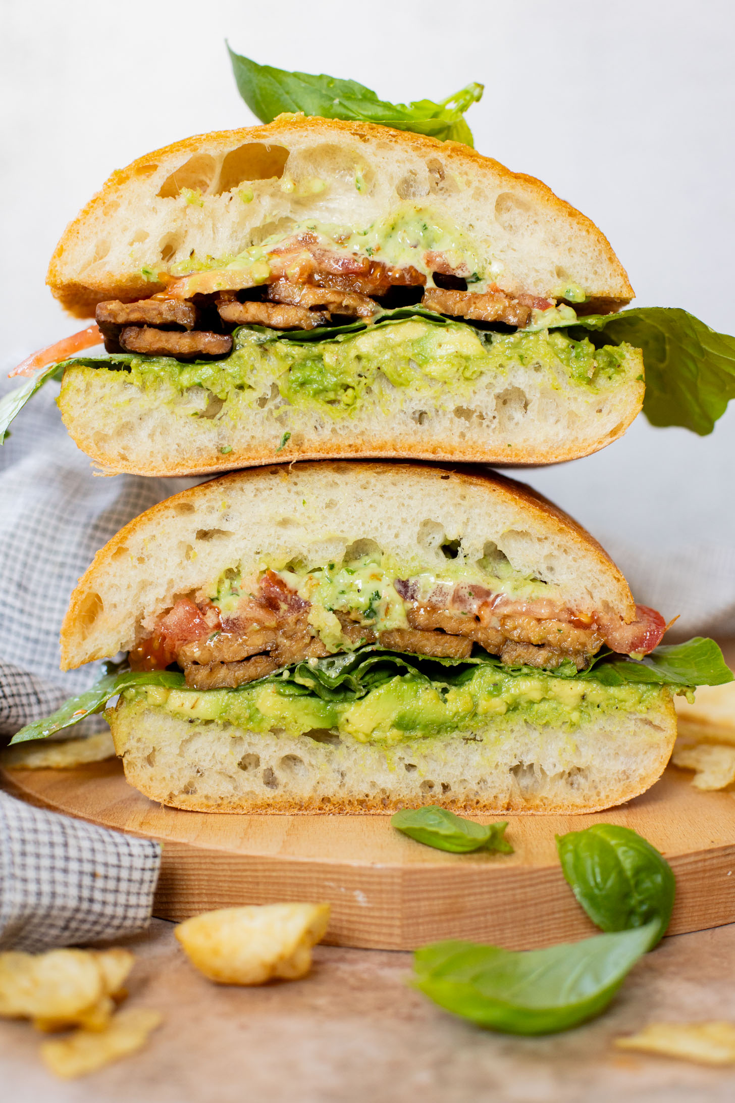 This Vegan Pesto BLT is a dream of a sandwich. Made with homemade pesto, crispy tempeh bacon on toasted ciabatta. You can't go wrong | ThisSavoryVegan.com