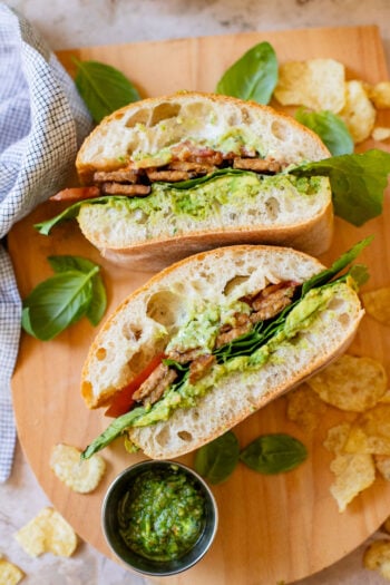 This Vegan Pesto BLT is a dream of a sandwich. Made with homemade pesto, crispy tempeh bacon on toasted ciabatta. You can't go wrong | ThisSavoryVegan.com