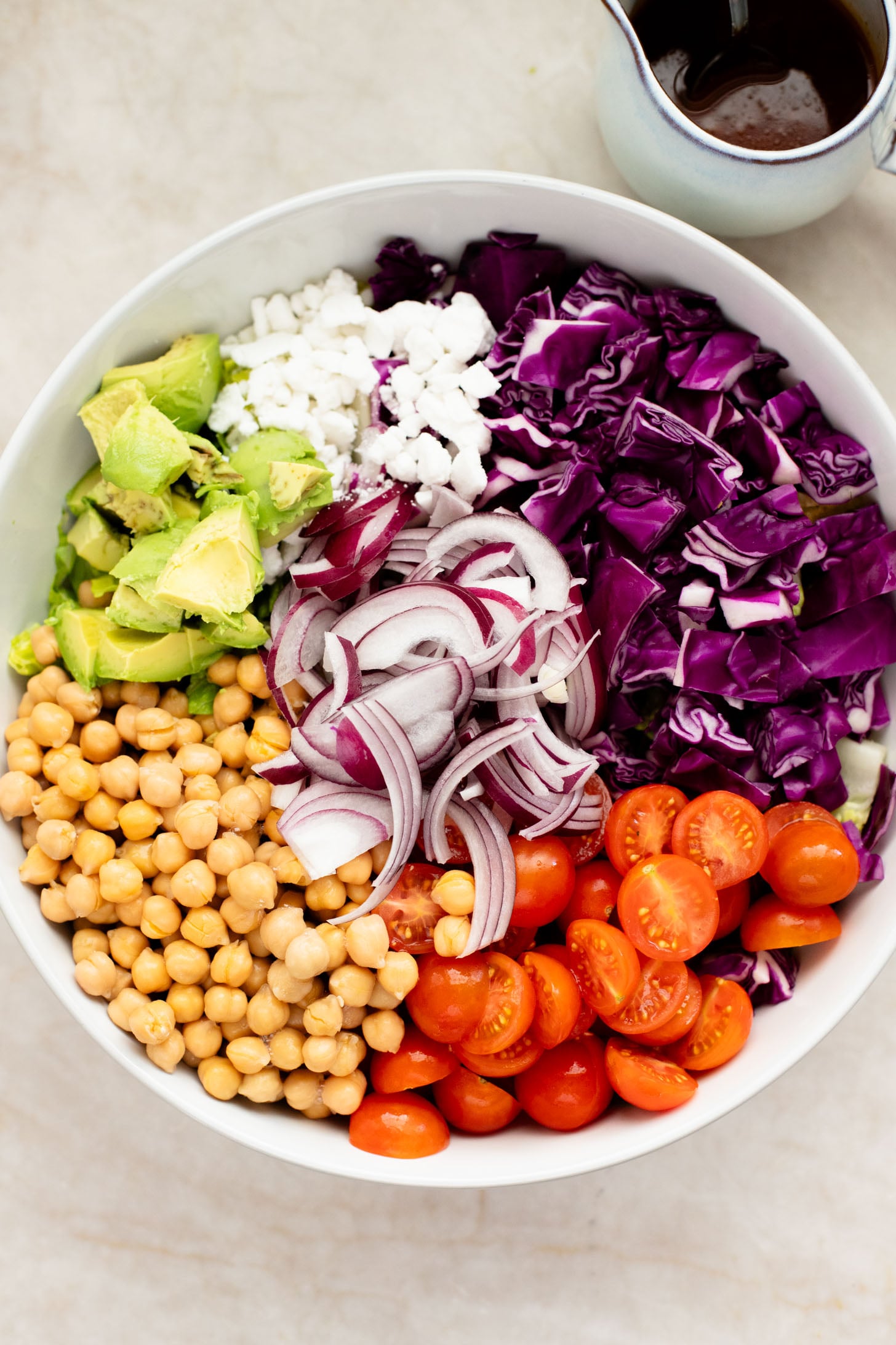 This Chipotle Chickpea Chopped Salad is a quick & easy meal that is packed with fresh veggies, a smoky chipotle dressing and chickpeas | ThisSavoryVegan.com