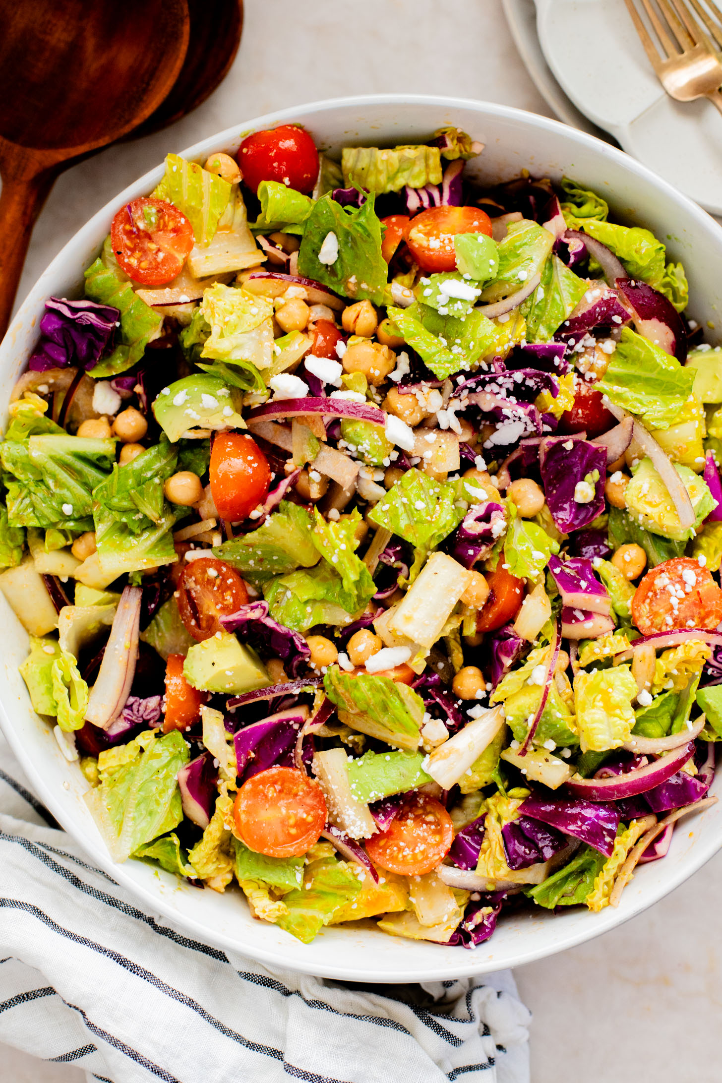 This Chipotle Chickpea Chopped Salad is a quick & easy meal that is packed with fresh veggies, a smoky chipotle dressing and chickpeas | ThisSavoryVegan.com